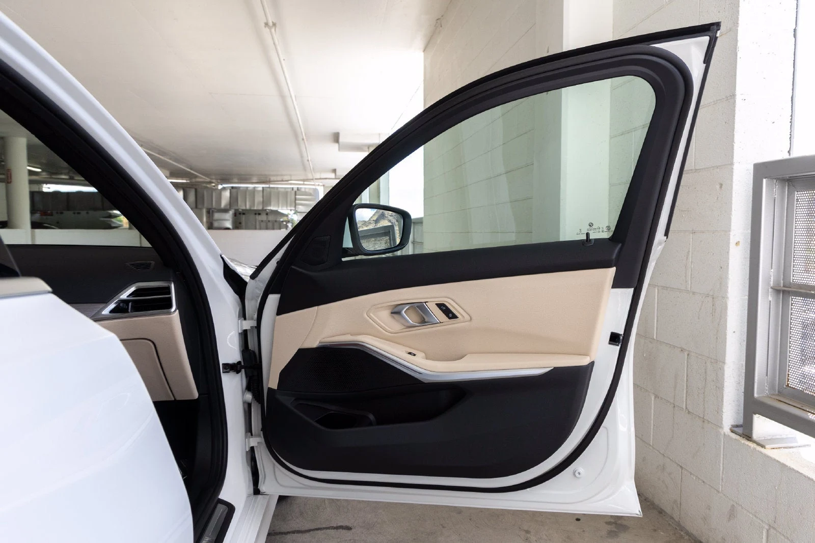 2026 BMW 330i Sedan interior, door panel, Canberra Beige Perforated Sensatec