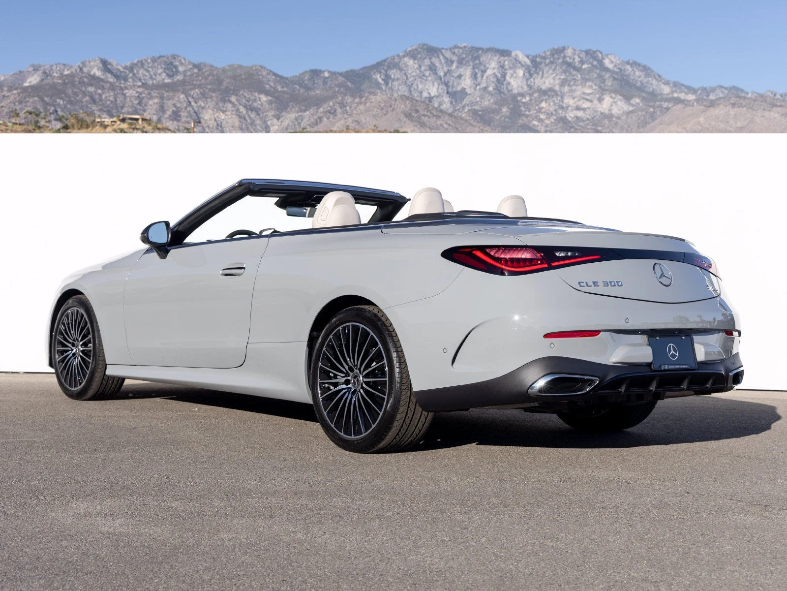 2027 Mercedes-Benz CLE 300 4MATIC Cabriolet, rear three-quarter view, Manufaktur Alpine Grey Metallic