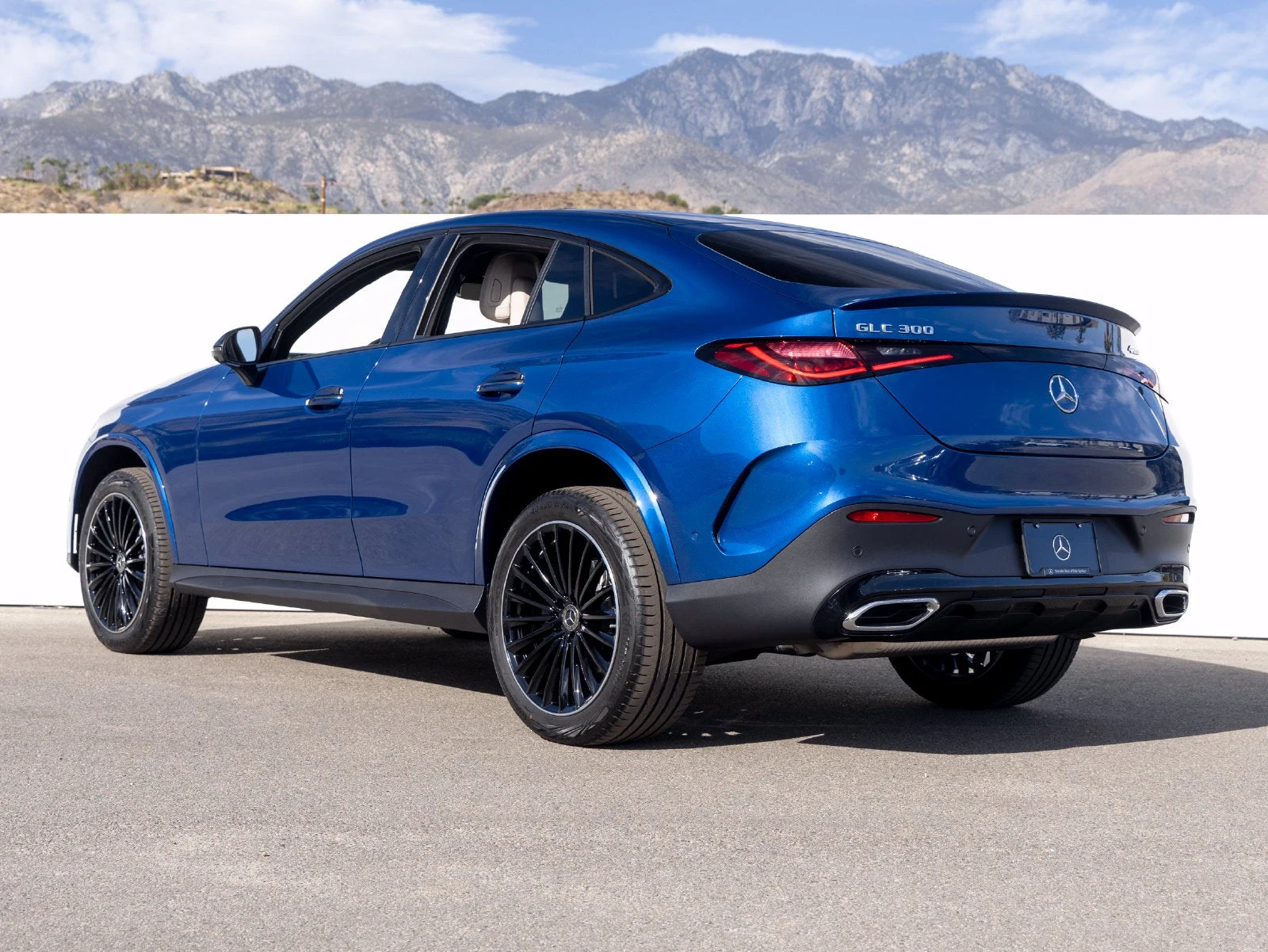 2027 Mercedes-Benz GLC 300 4MATIC Coupé, rear three-quarter view, Starling Blue Metallic