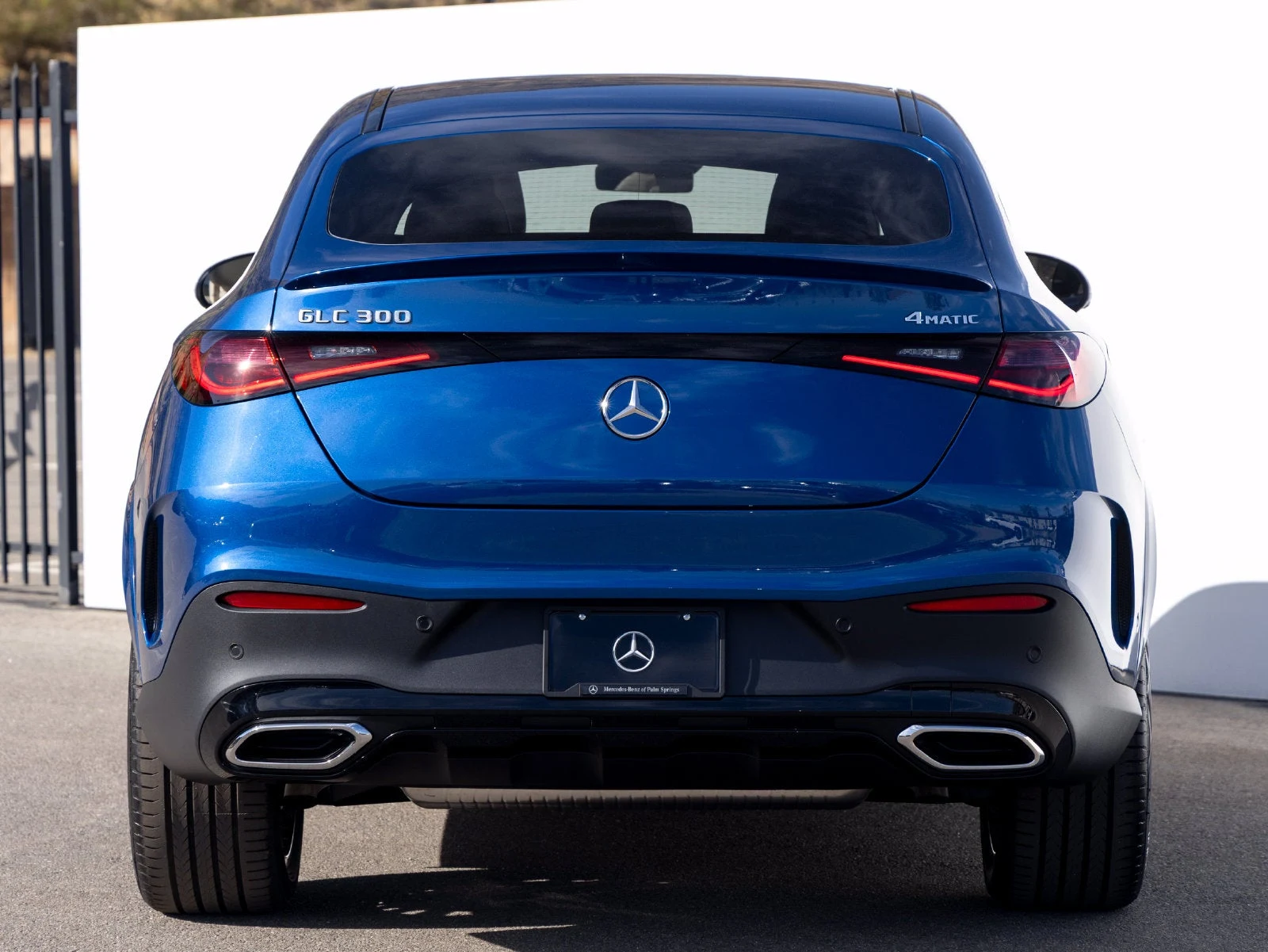 2027 Mercedes-Benz GLC 300 4MATIC Coupé, rear three-quarter view, Starling Blue Metallic