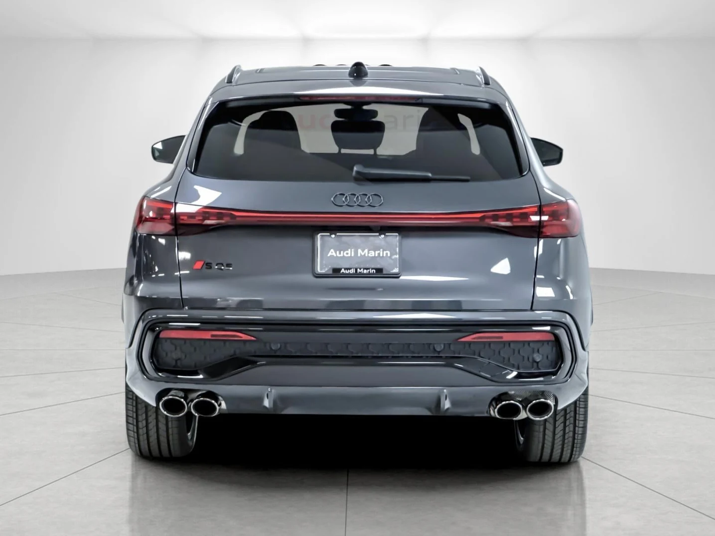 2026 Audi SQ5 Premium Plus quattro, rear three-quarter view, Tambora Gray Metallic