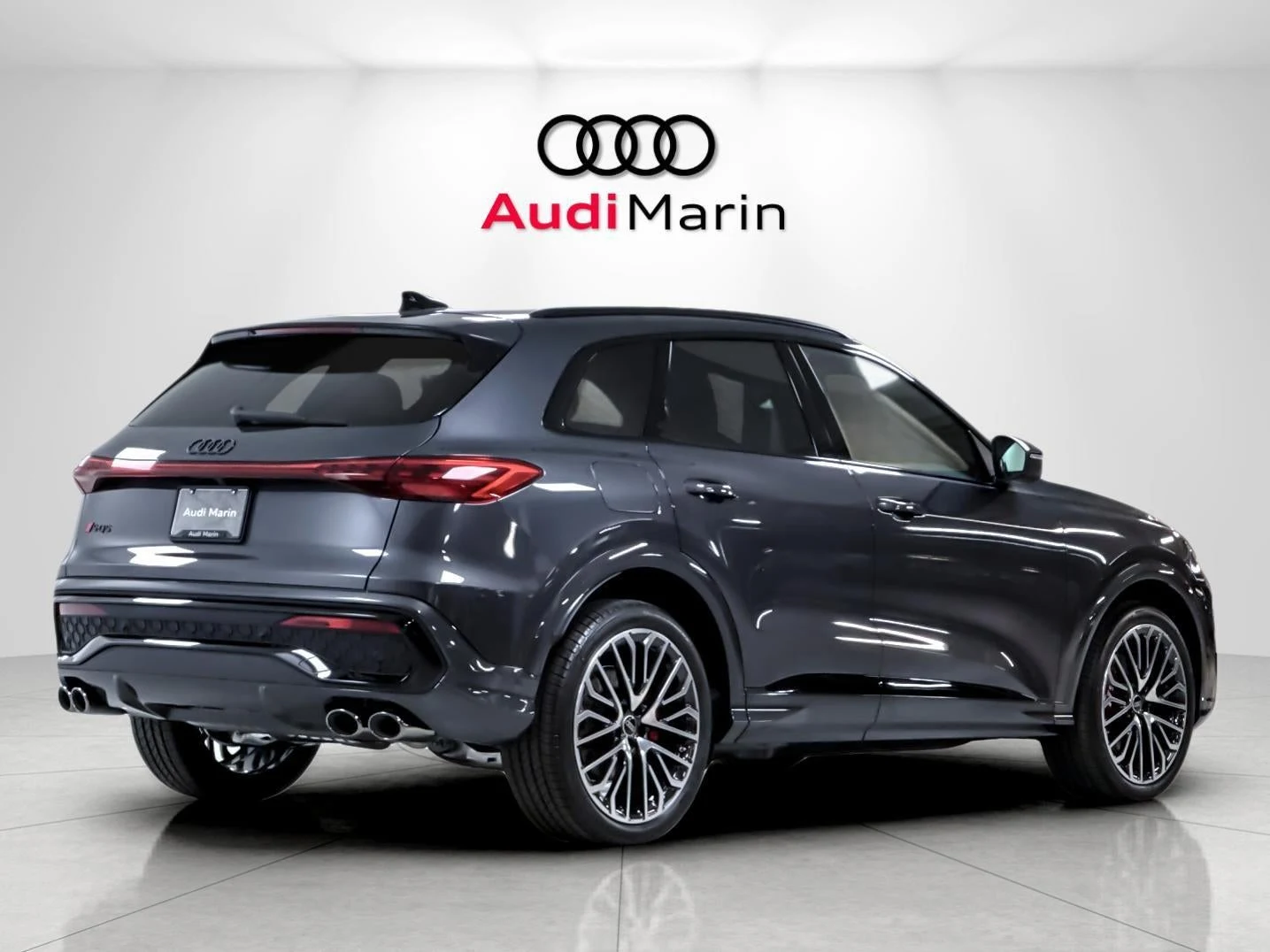 2026 Audi SQ5 Premium Plus quattro, rear three-quarter view, Tambora Gray Metallic