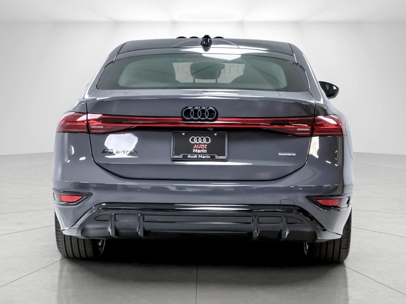 2027 Audi A6 e-tron Sportback Prestige quattro, rear three-quarter view, Magnet Gray