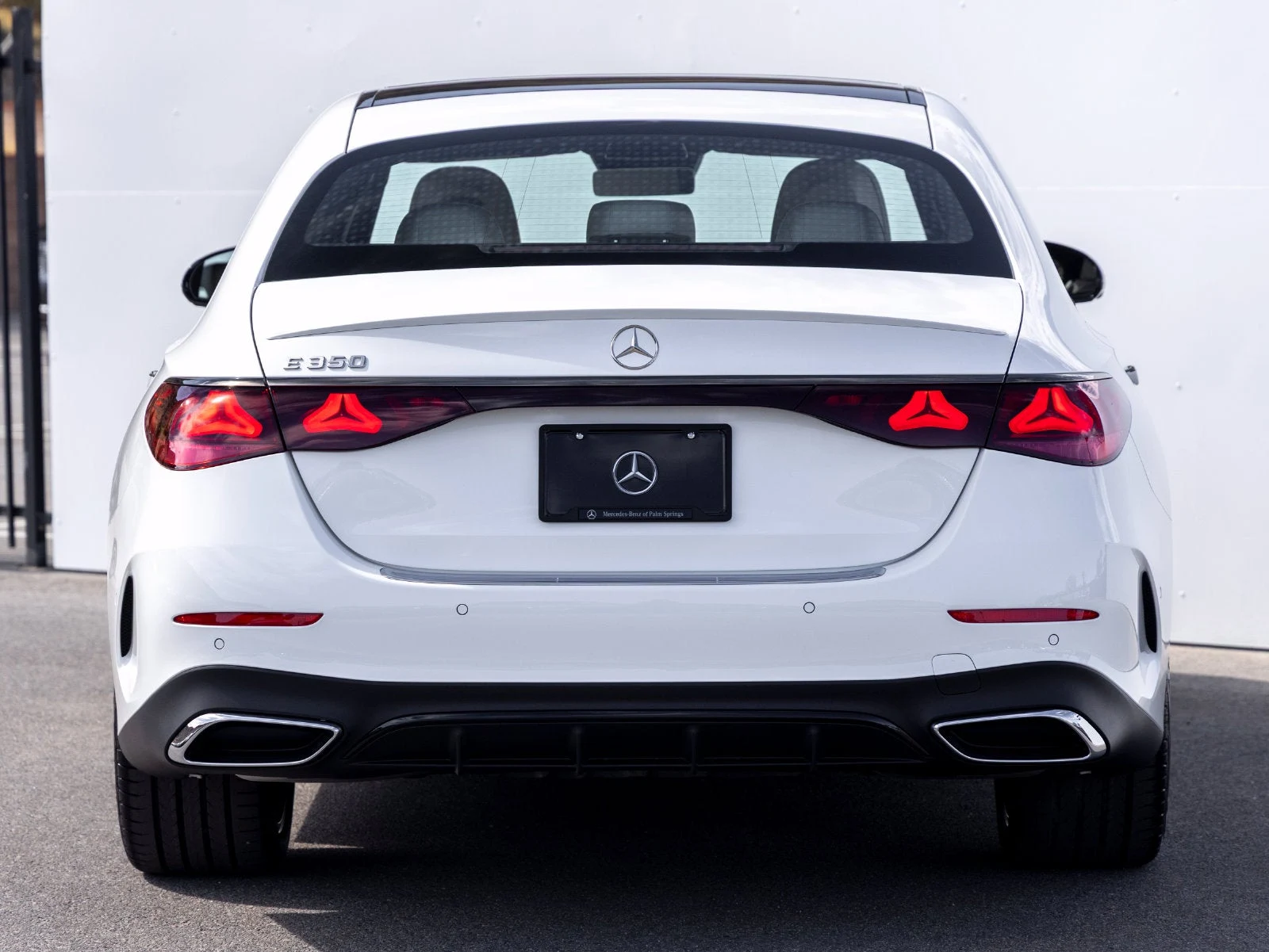 2027 Mercedes-Benz E 350, rear three-quarter view, Polar White