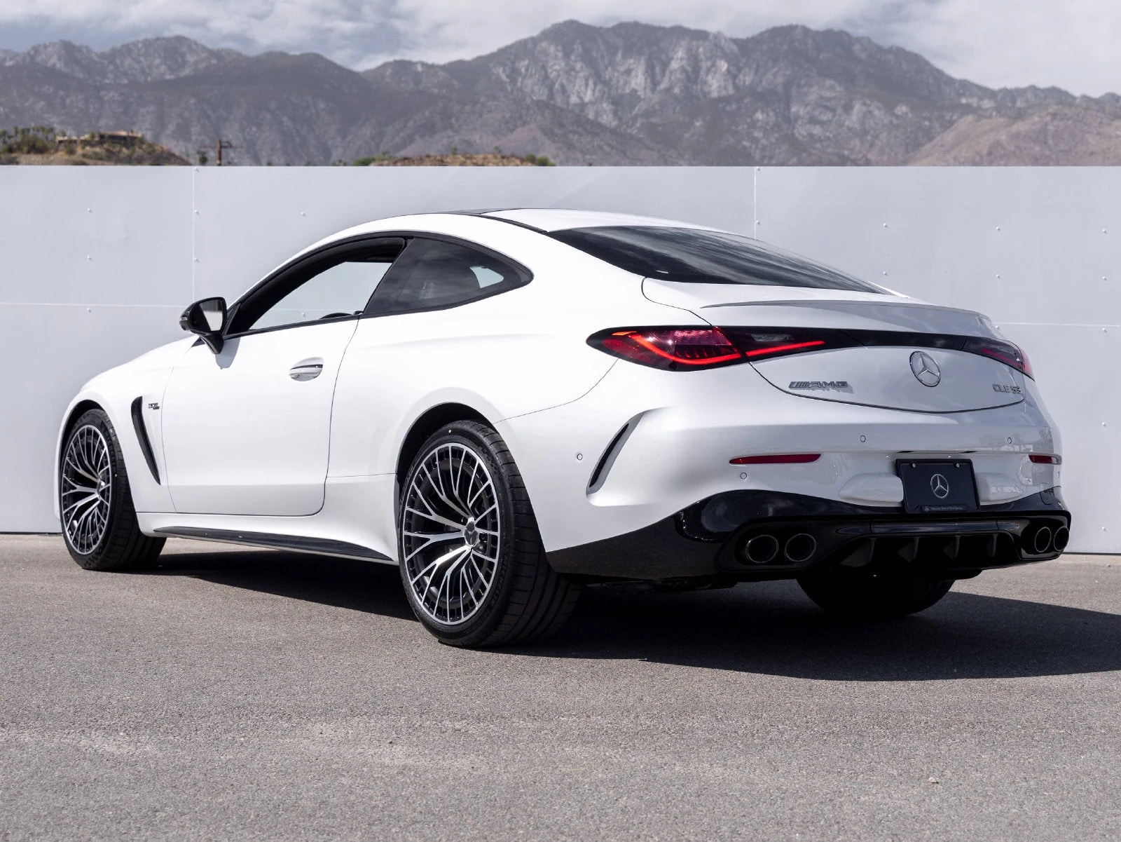 2027 Mercedes-AMG CLE 53 4MATIC+ Coupé, rear three-quarter view, Manufaktur Moonlight White Metallic