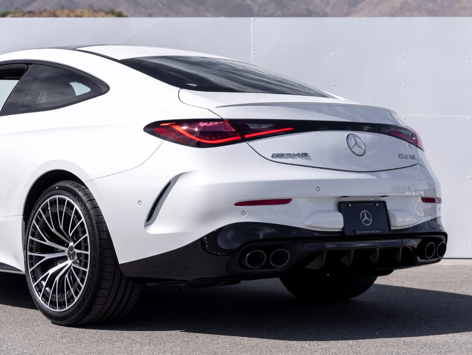 2027 Mercedes-AMG CLE 53 4MATIC+ Coupé, rear three-quarter view, Manufaktur Moonlight White Metallic