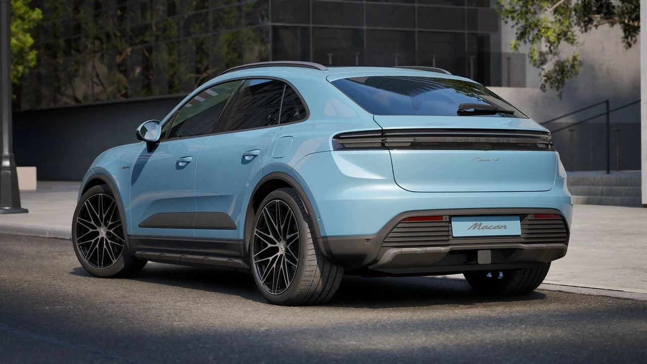 2027 Porsche Macan 4 Electric, rear three-quarter view, Frozen Blue Metallic