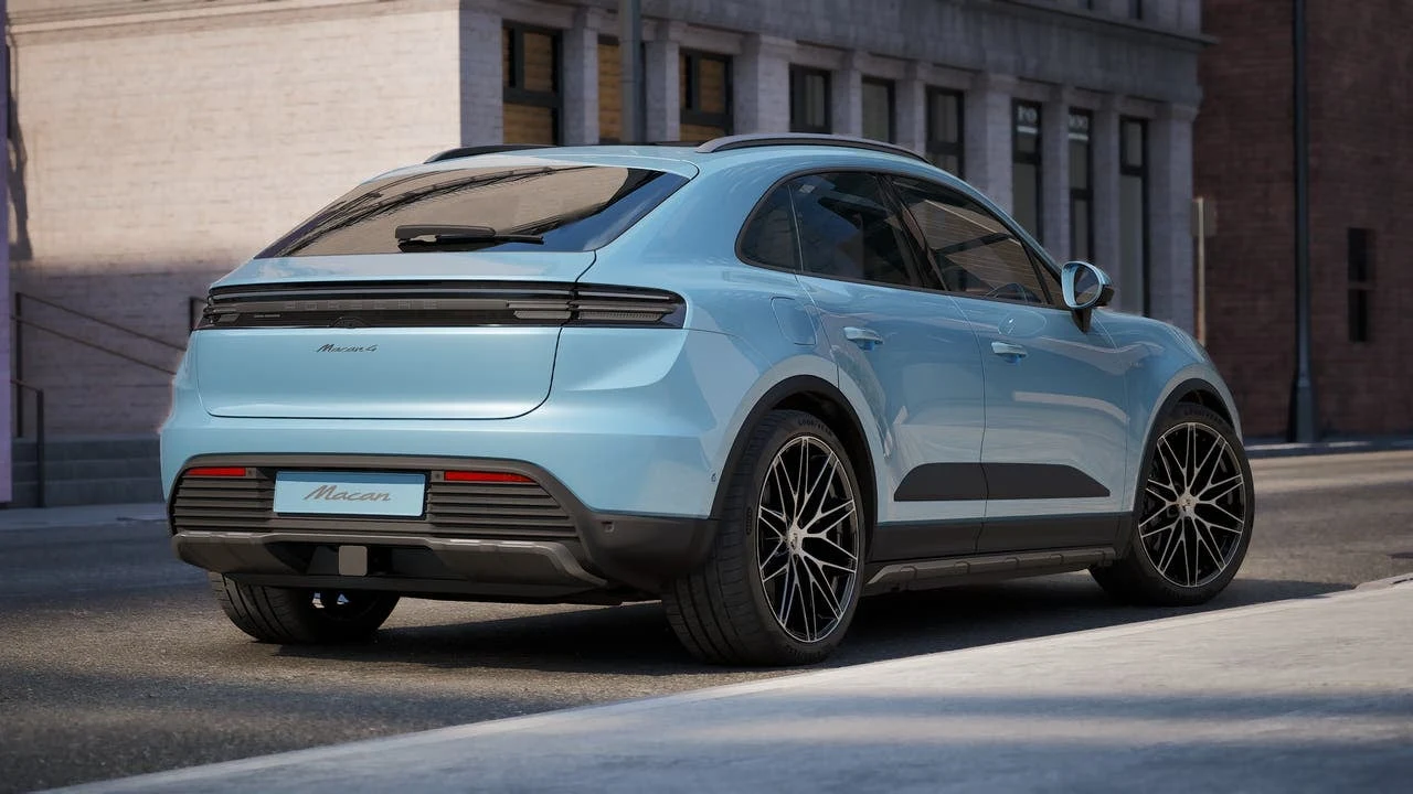 2027 Porsche Macan 4 Electric, rear three-quarter view, Frozen Blue Metallic