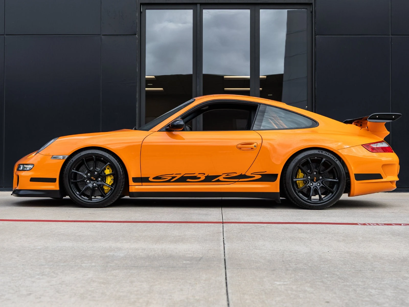 2007 Porsche 911 GT3 RS, side profile, Orange with contrasting Black