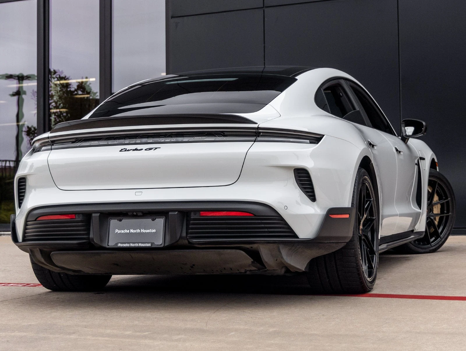 2025 Porsche Taycan Turbo GT, rear three-quarter view, White