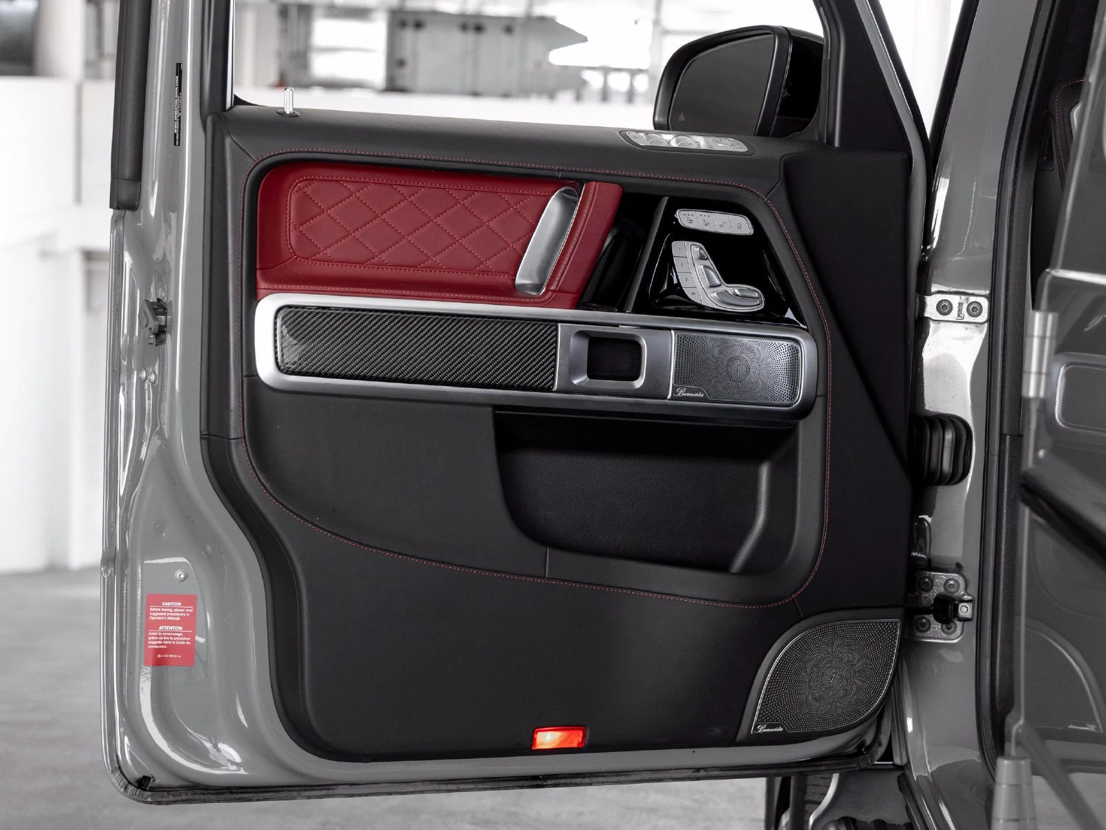 2022 Mercedes-AMG G 63 interior, door panel, Bengal Red / Black leather