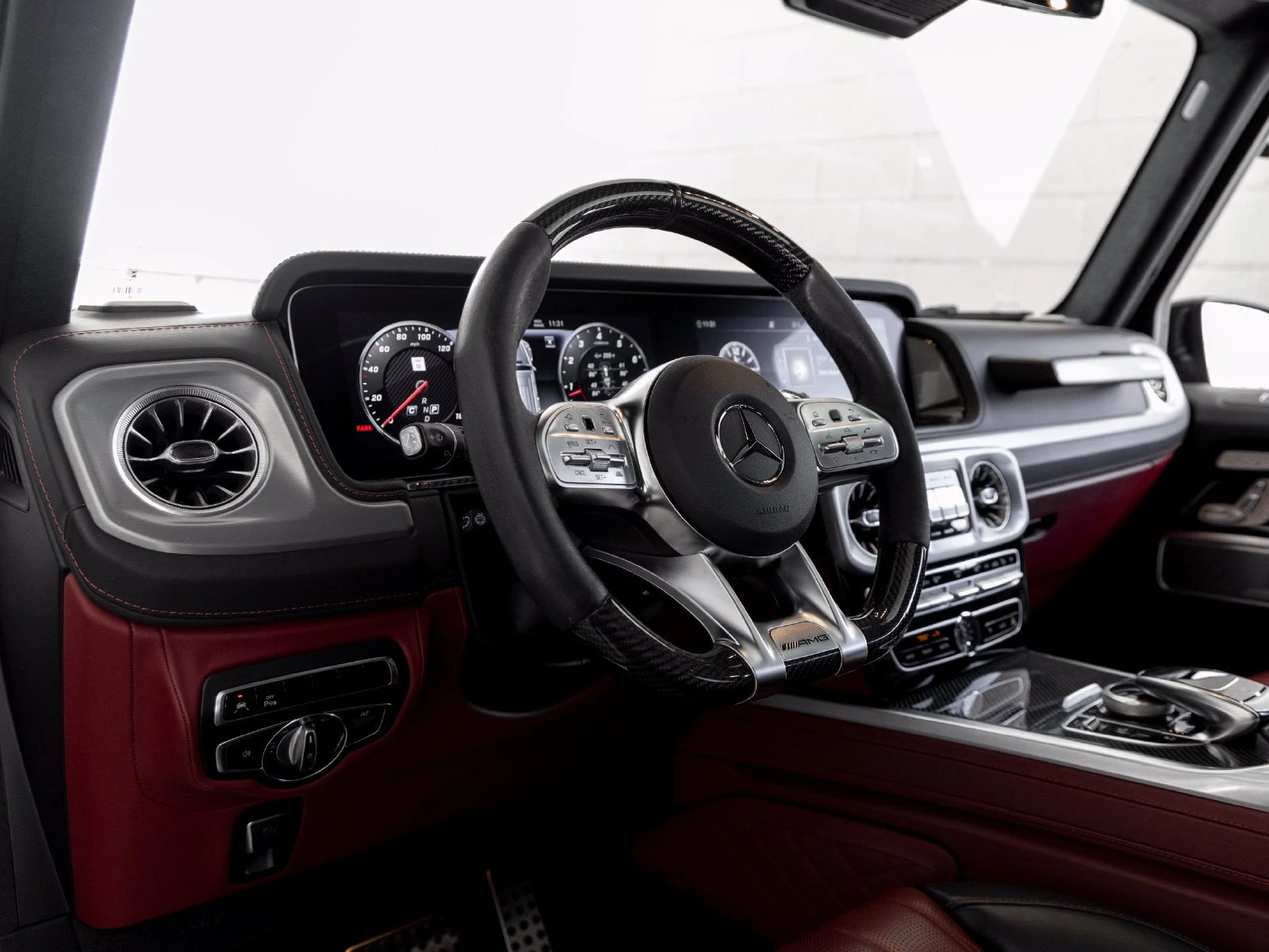 2022 Mercedes-AMG G 63 interior, dashboard, Bengal Red / Black leather