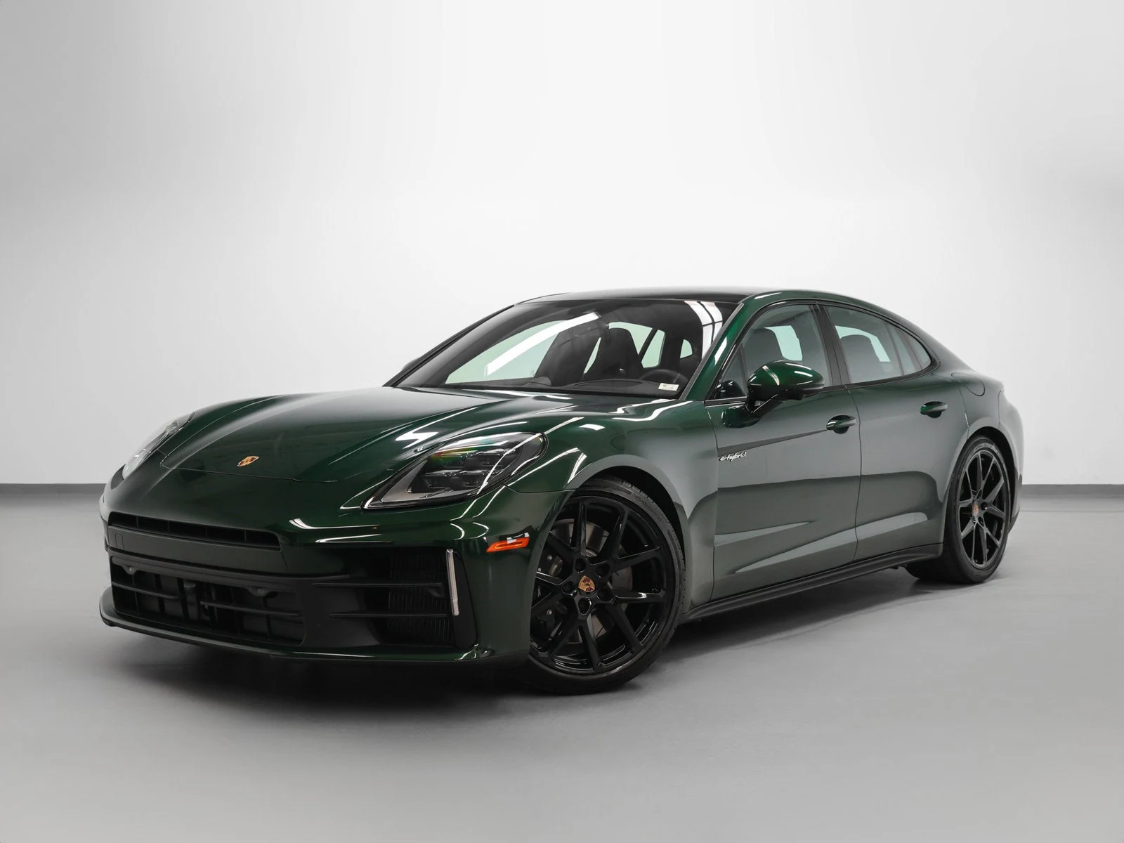 2026 Porsche Panamera 4 E-Hybrid for sale, front three-quarter view, Oak Green Metallic Neo