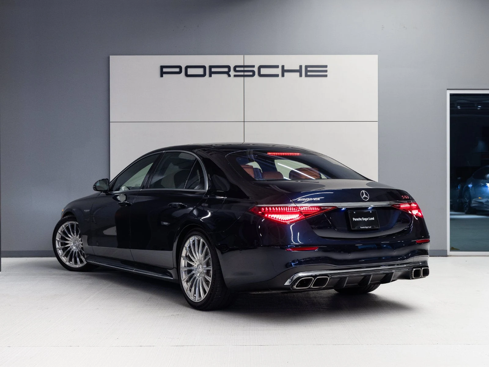 2024 Mercedes-AMG S 63 E PERFORMANCE, rear three-quarter view, Nautical Blue Metallic