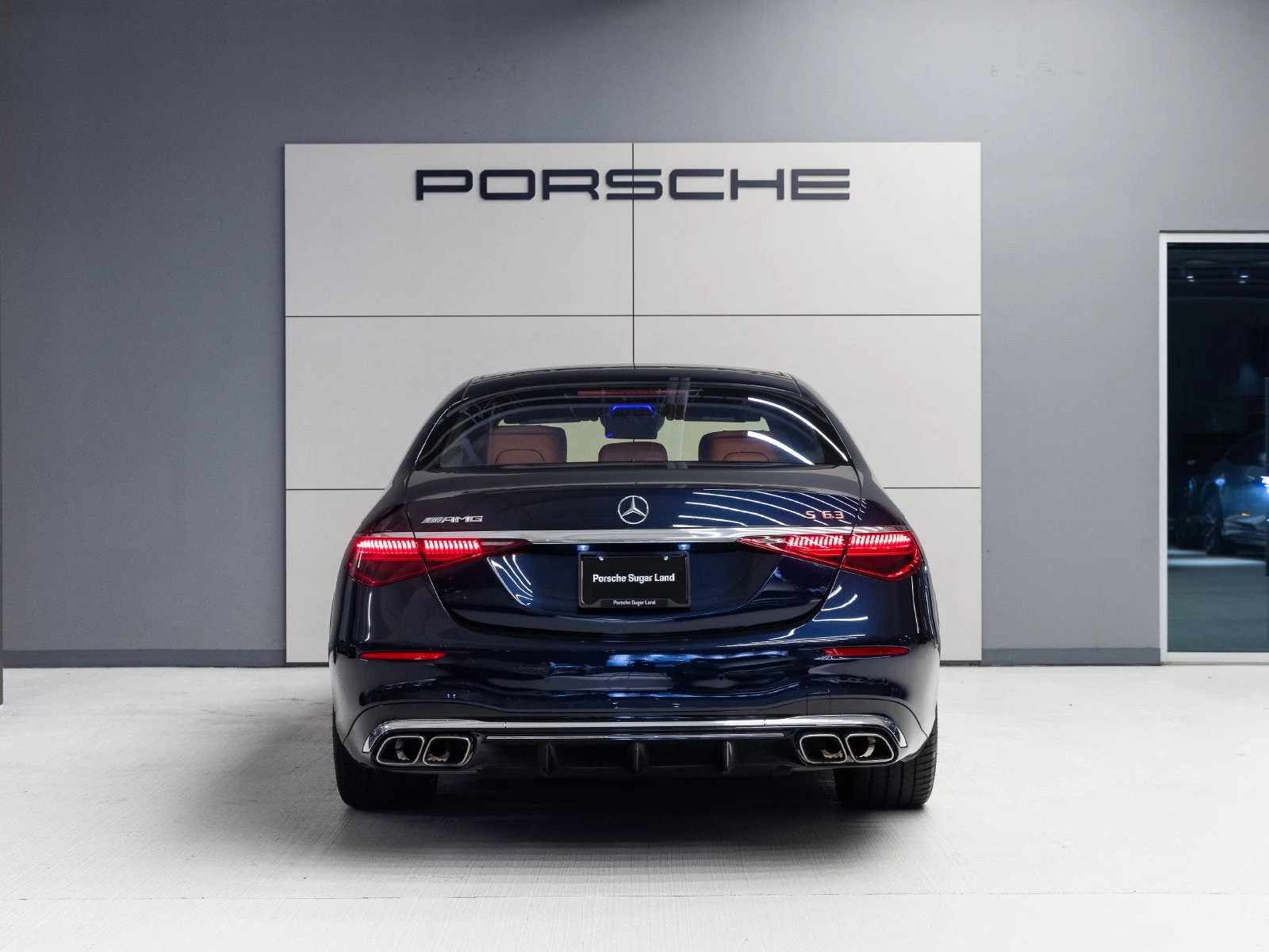 2024 Mercedes-AMG S 63 E PERFORMANCE, rear three-quarter view, Nautical Blue Metallic