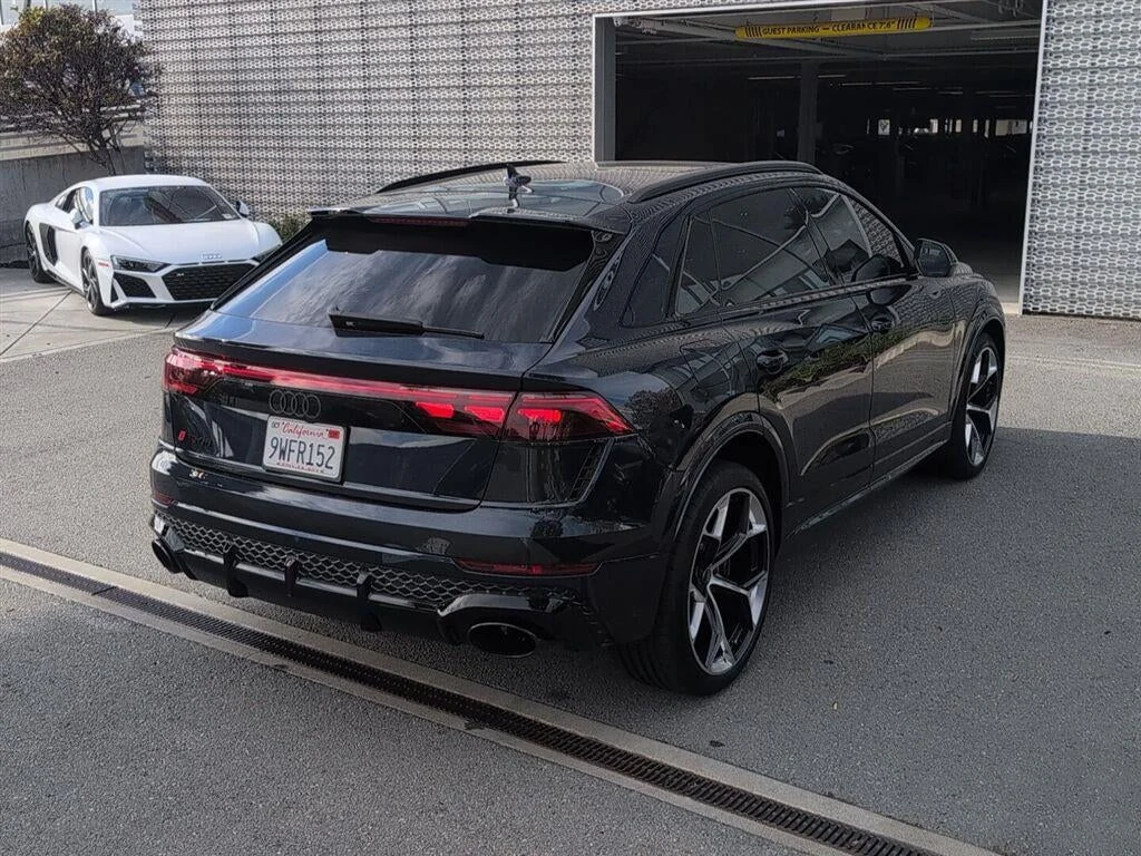 2025 Audi RS Q8 performance, rear three-quarter view, Waitomo Blue Metallic