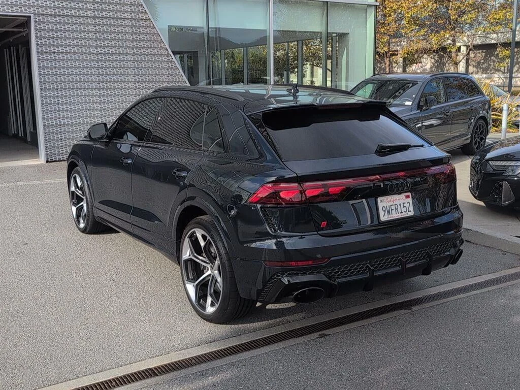 2025 Audi RS Q8 performance, rear three-quarter view, Waitomo Blue Metallic