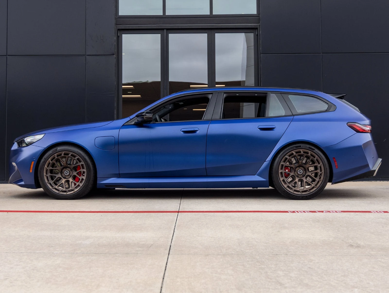 2026 BMW M5 Touring for sale, exterior, Marina Bay Blue Metallic
