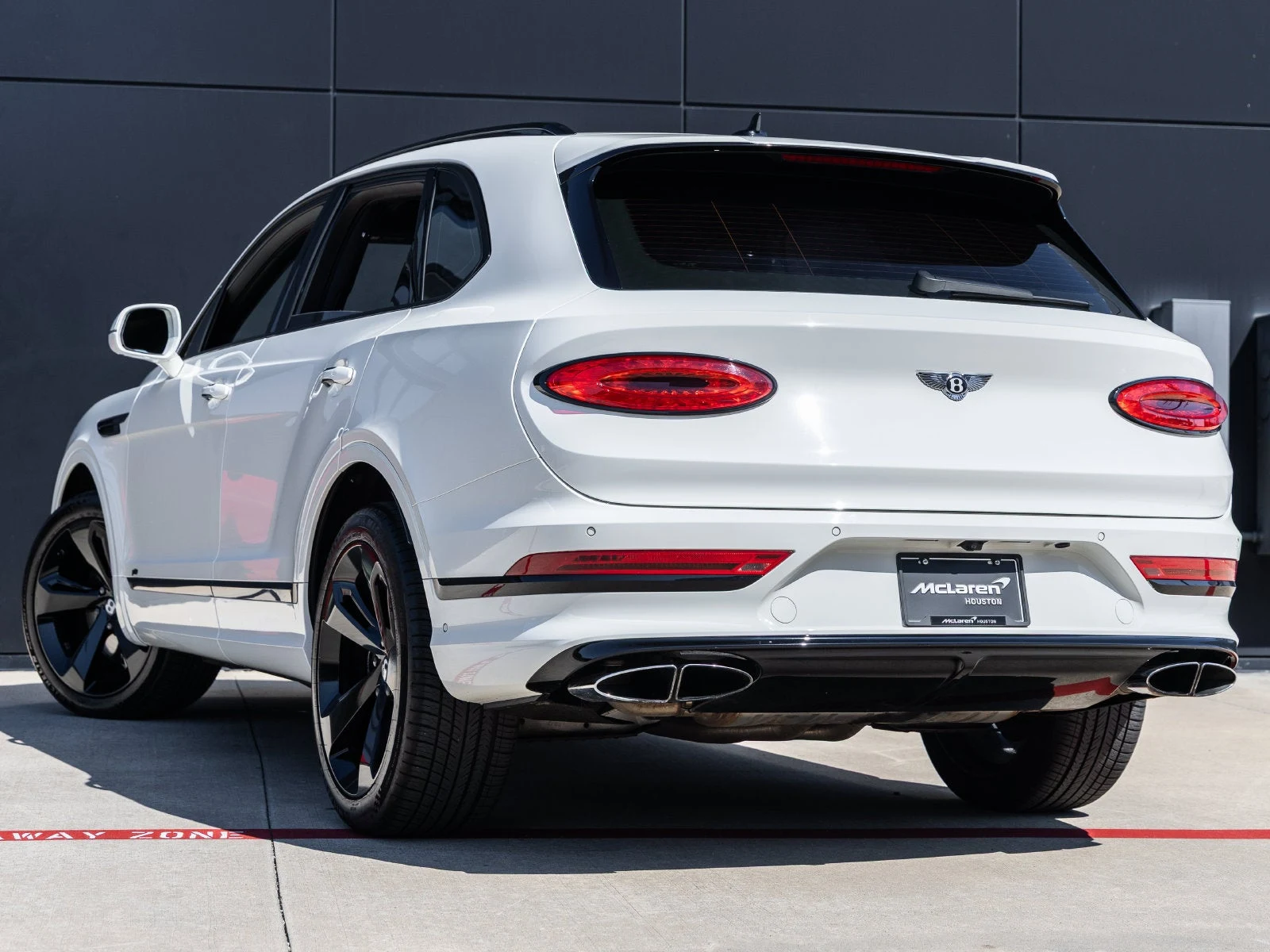2021 Bentley Bentayga V8, rear three-quarter view, Glacier White