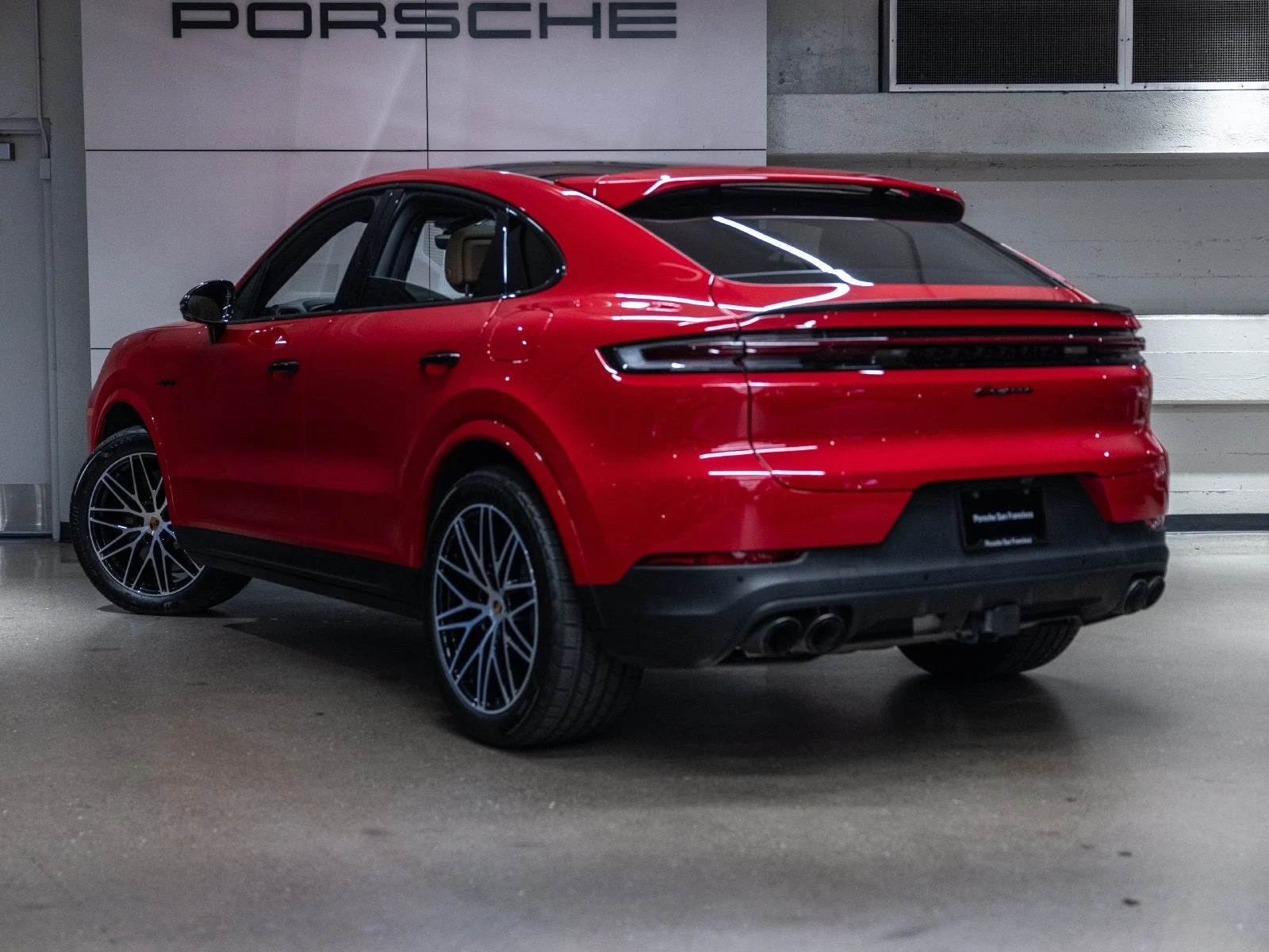 2025 Porsche Cayenne E-Hybrid Coupe, rear three-quarter view, Carmine Red