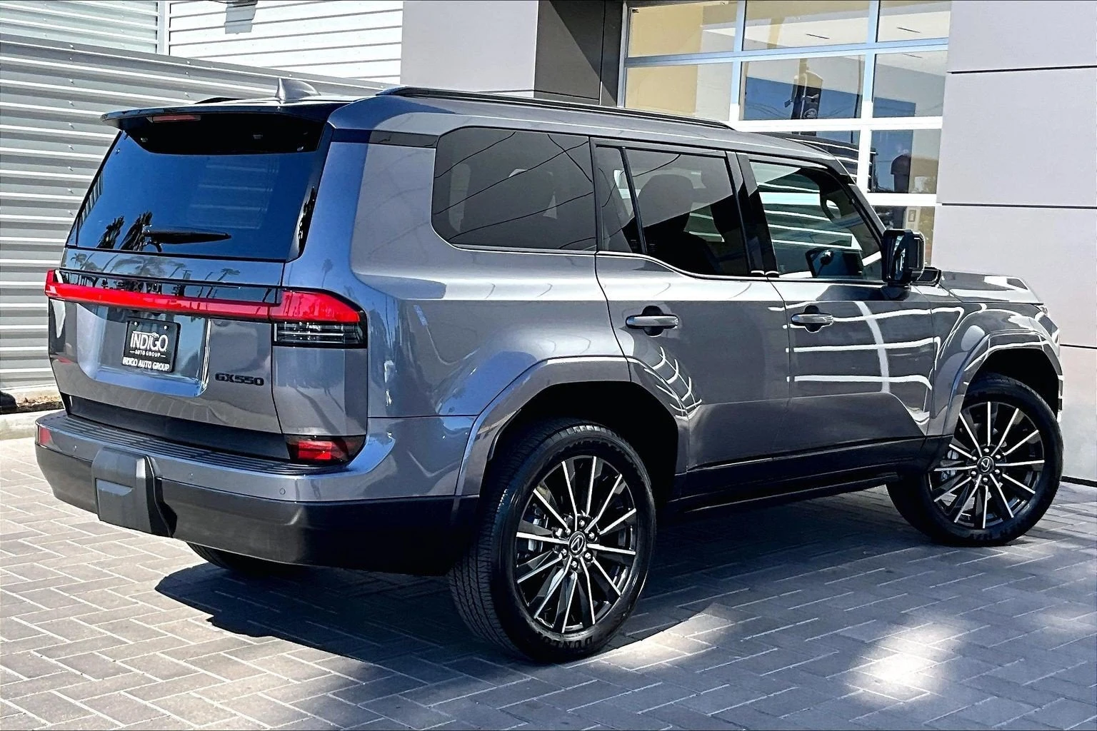 2026 Lexus GX 550 Luxury+, rear three-quarter view, Nebula Gray Pearl