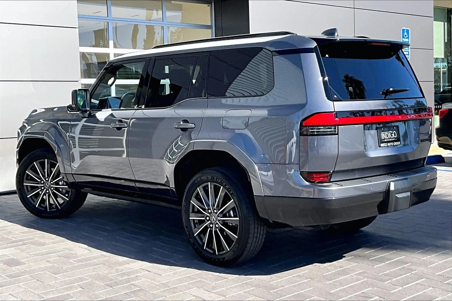 2026 Lexus GX 550 Luxury+, rear three-quarter view, Nebula Gray Pearl