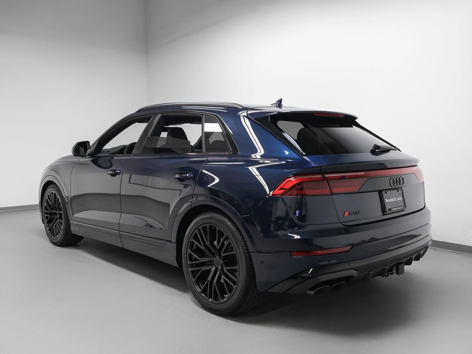 2026 Audi SQ8 4.0T Premium Plus quattro, rear three-quarter view, Waitomo Blue Metallic