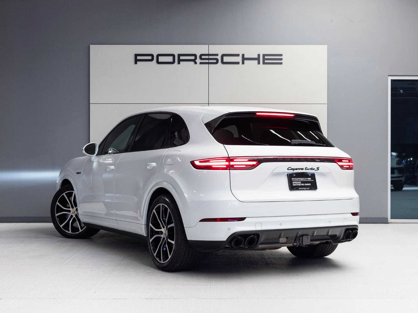 2020 Porsche Cayenne Turbo S E-Hybrid, rear three-quarter view, White