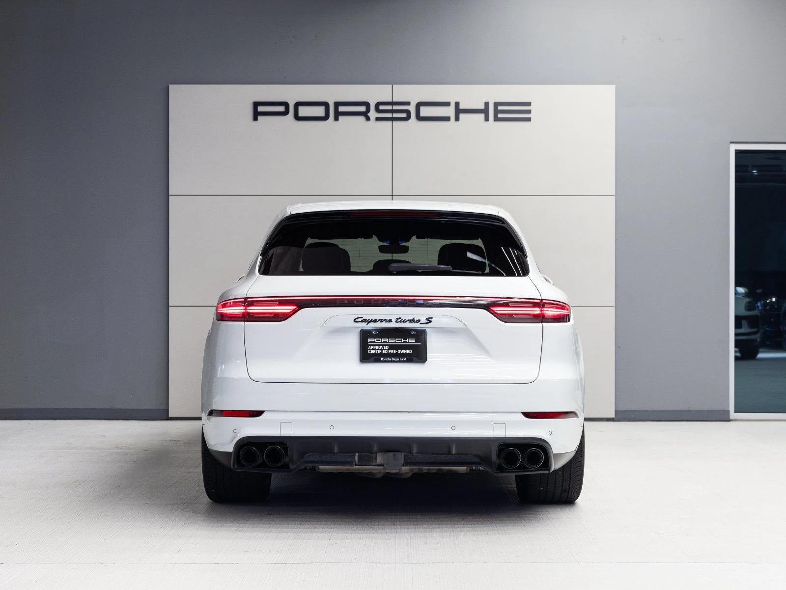 2020 Porsche Cayenne Turbo S E-Hybrid, rear three-quarter view, White
