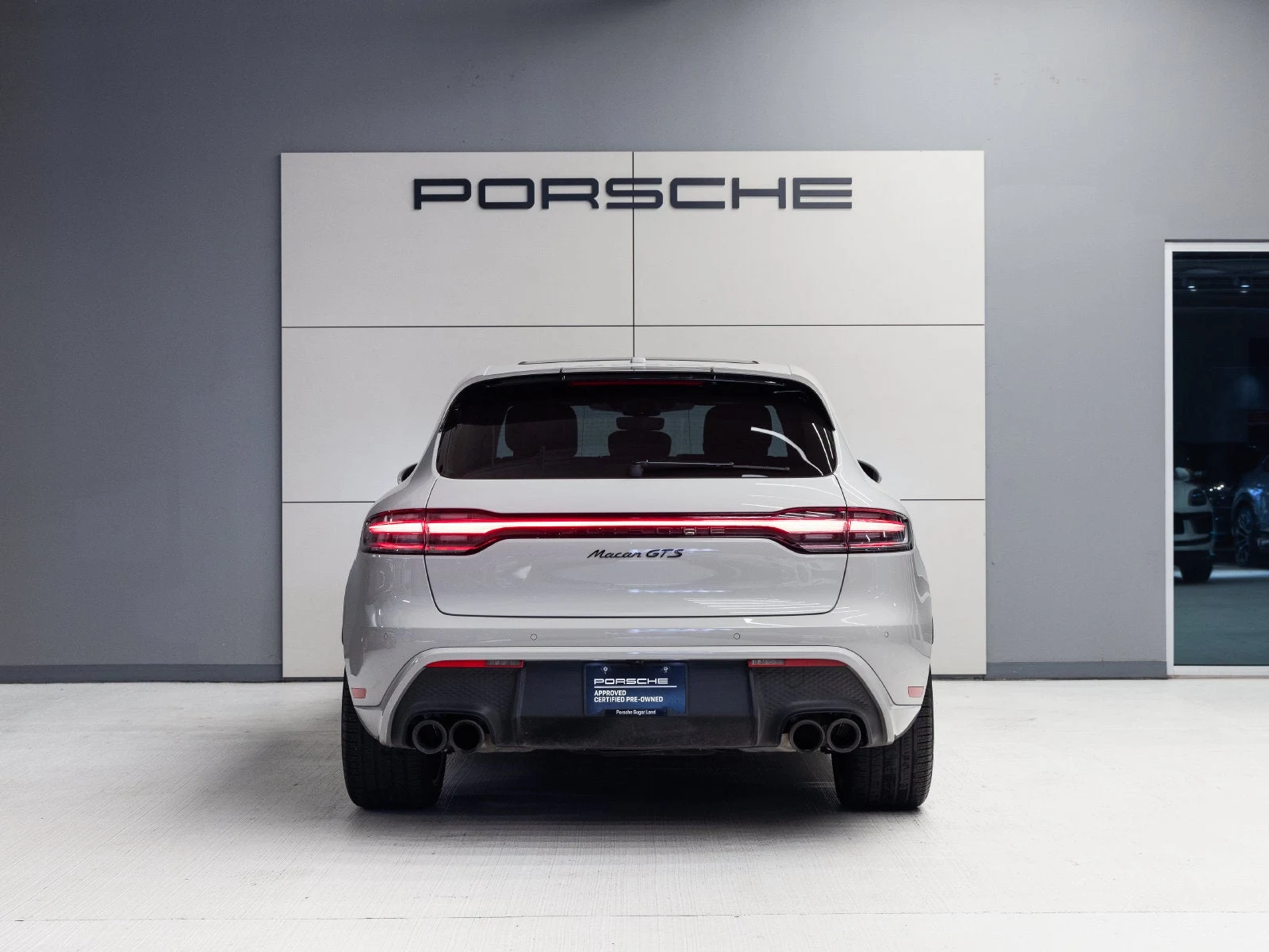2024 Porsche Macan GTS, rear three-quarter view, Chalk