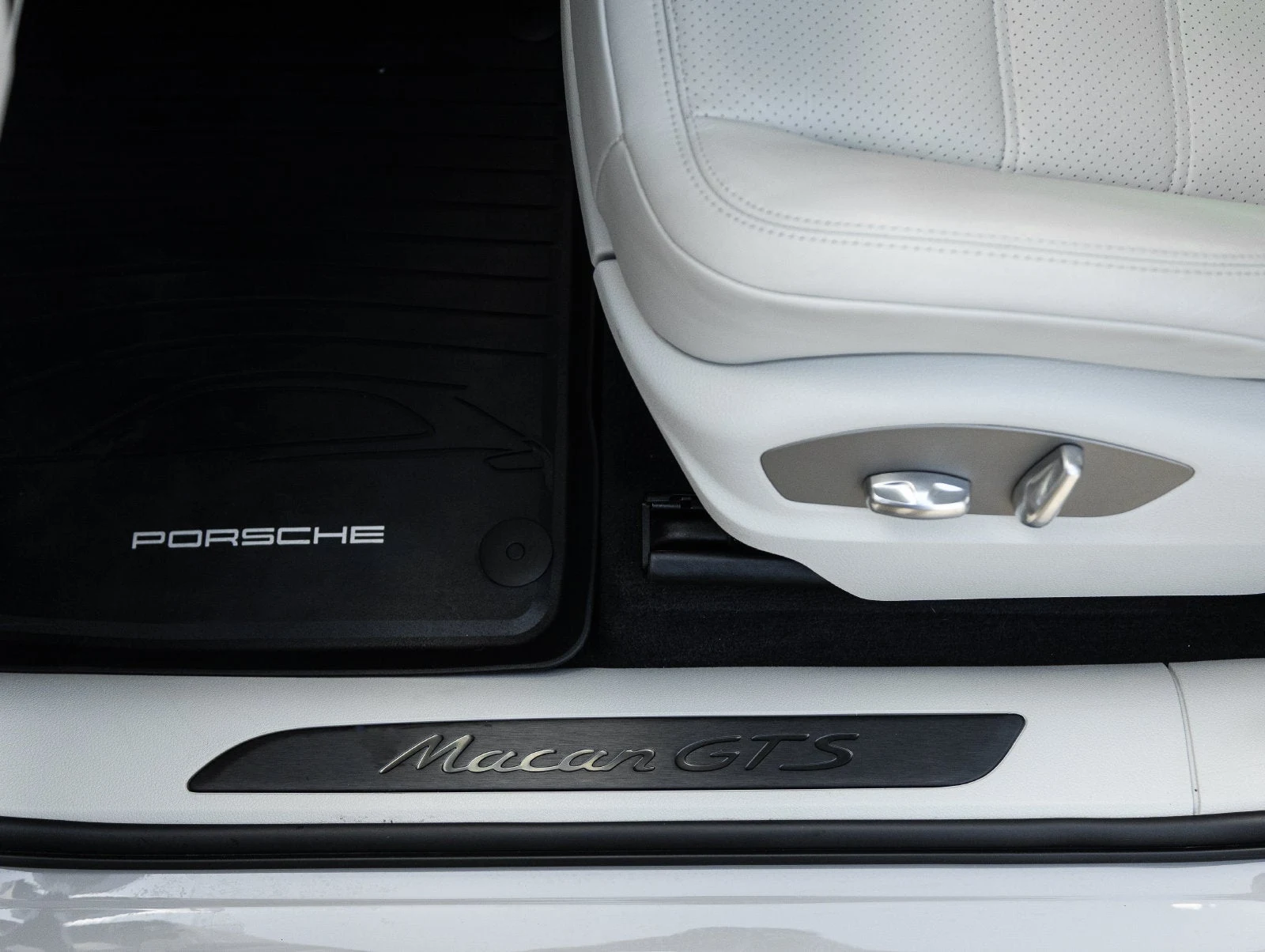 2024 Porsche Macan GTS interior, door sill, Black / Pebble Grey leather