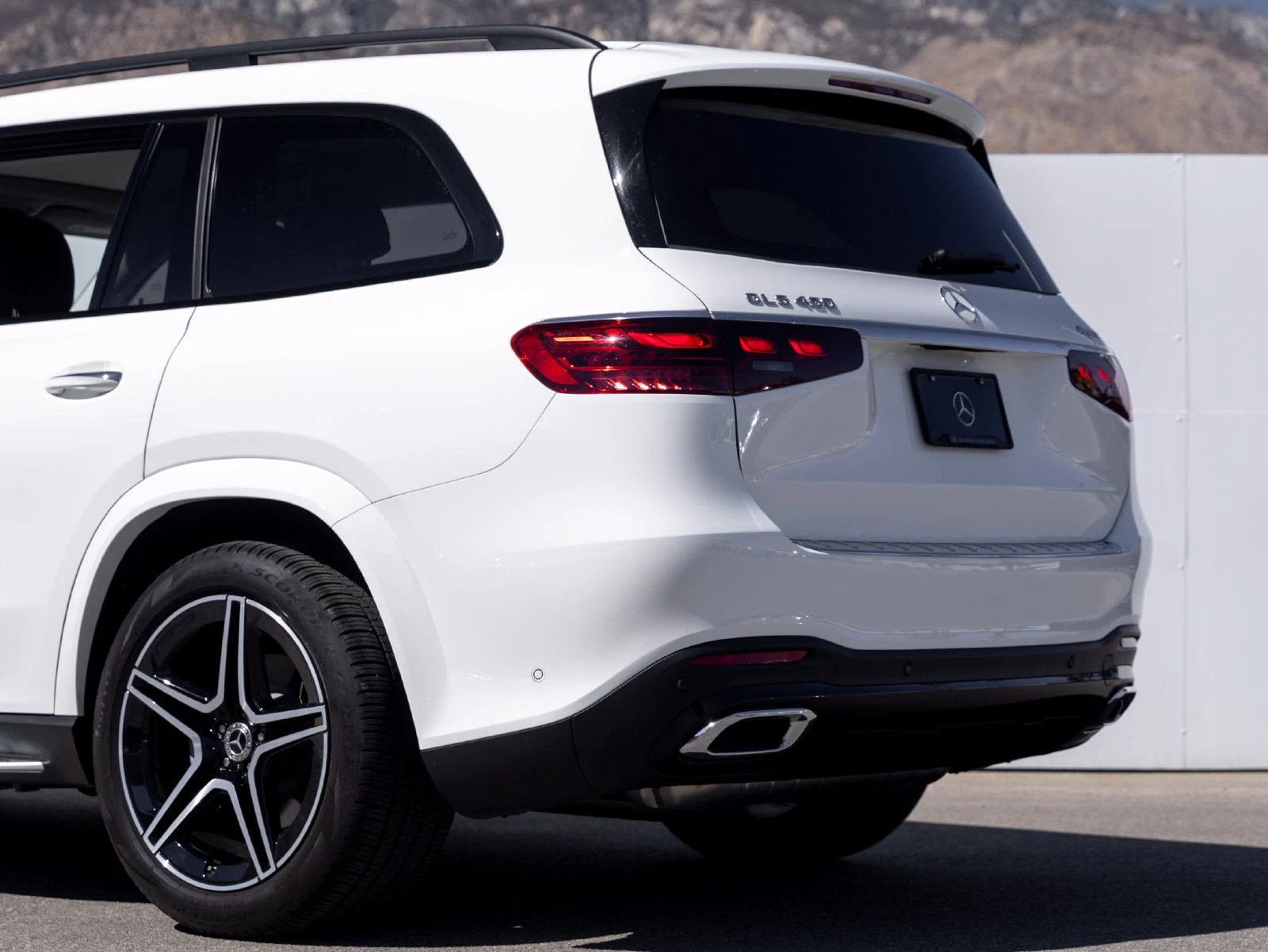 2026 Mercedes-Benz GLS 450 4MATIC, rear three-quarter view, Polar White