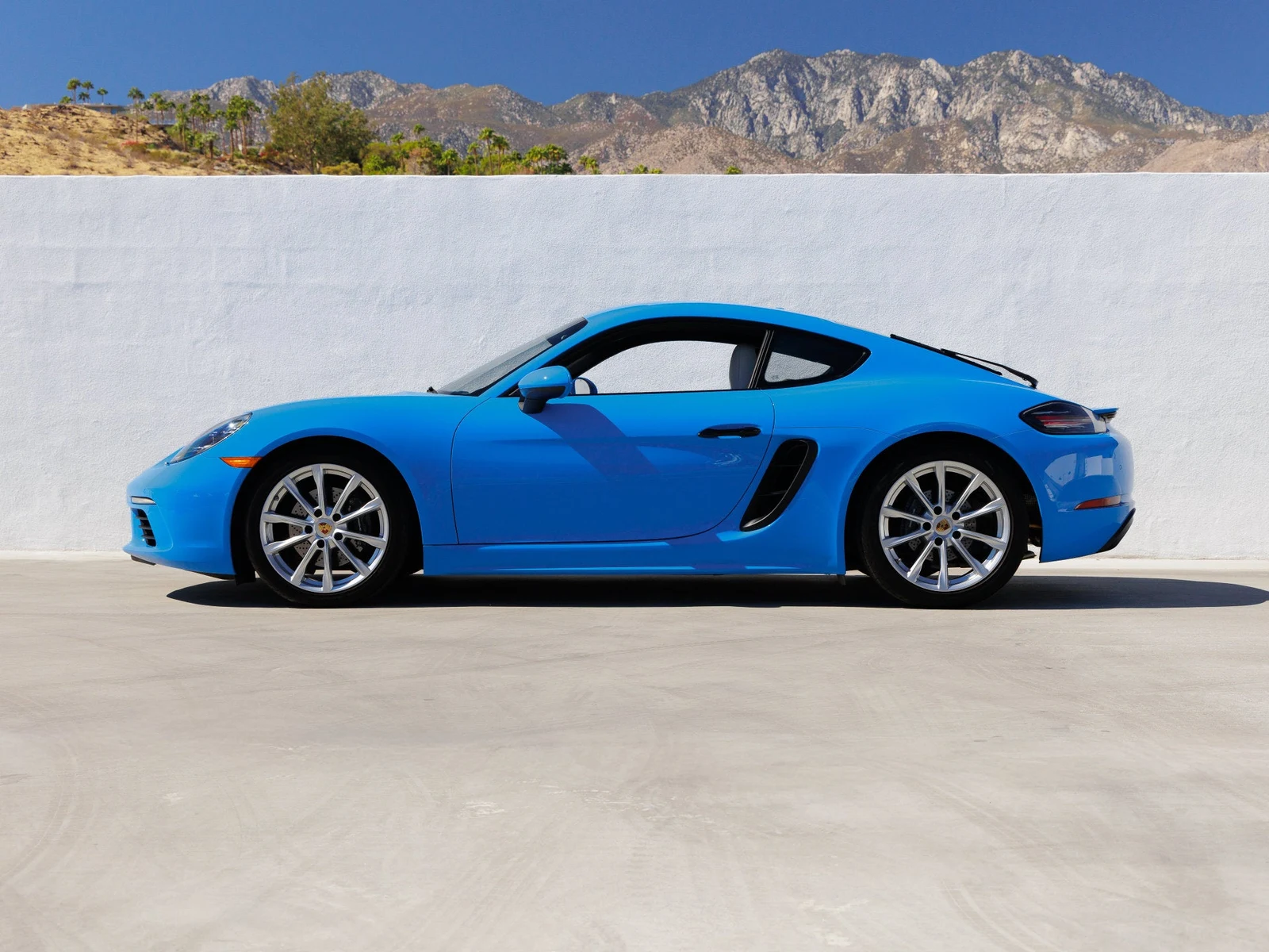 2024 Porsche 718 Cayman, side profile, Shark Blue