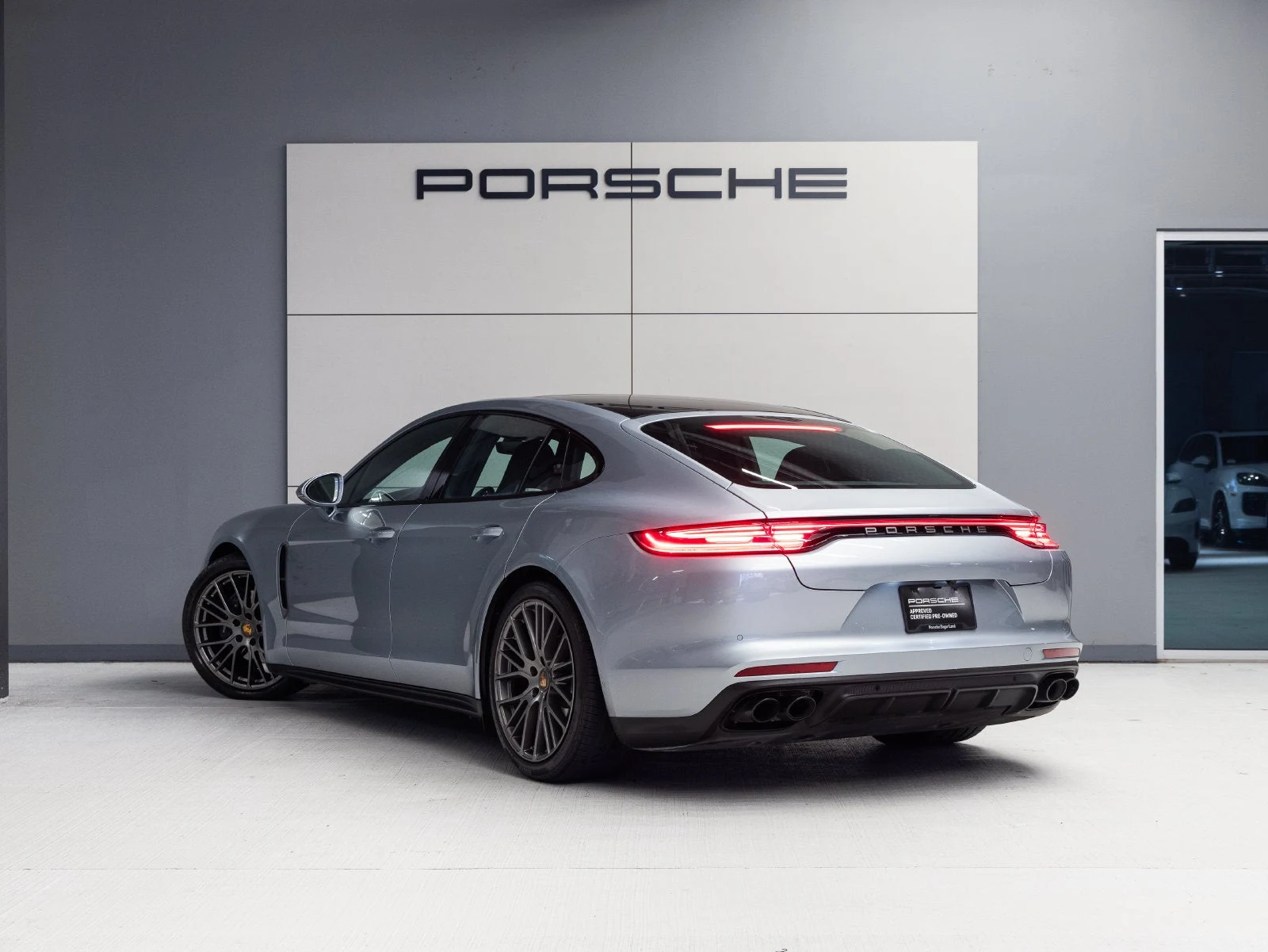 2023 Porsche Panamera Platinum Edition, rear three-quarter view, Dolomite Silver Metallic