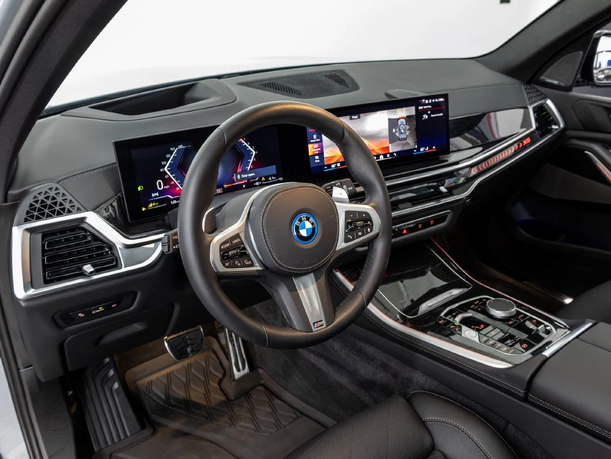 2026 BMW X5 xDrive50e interior, dashboard, Black Sensafin with decorative stitching