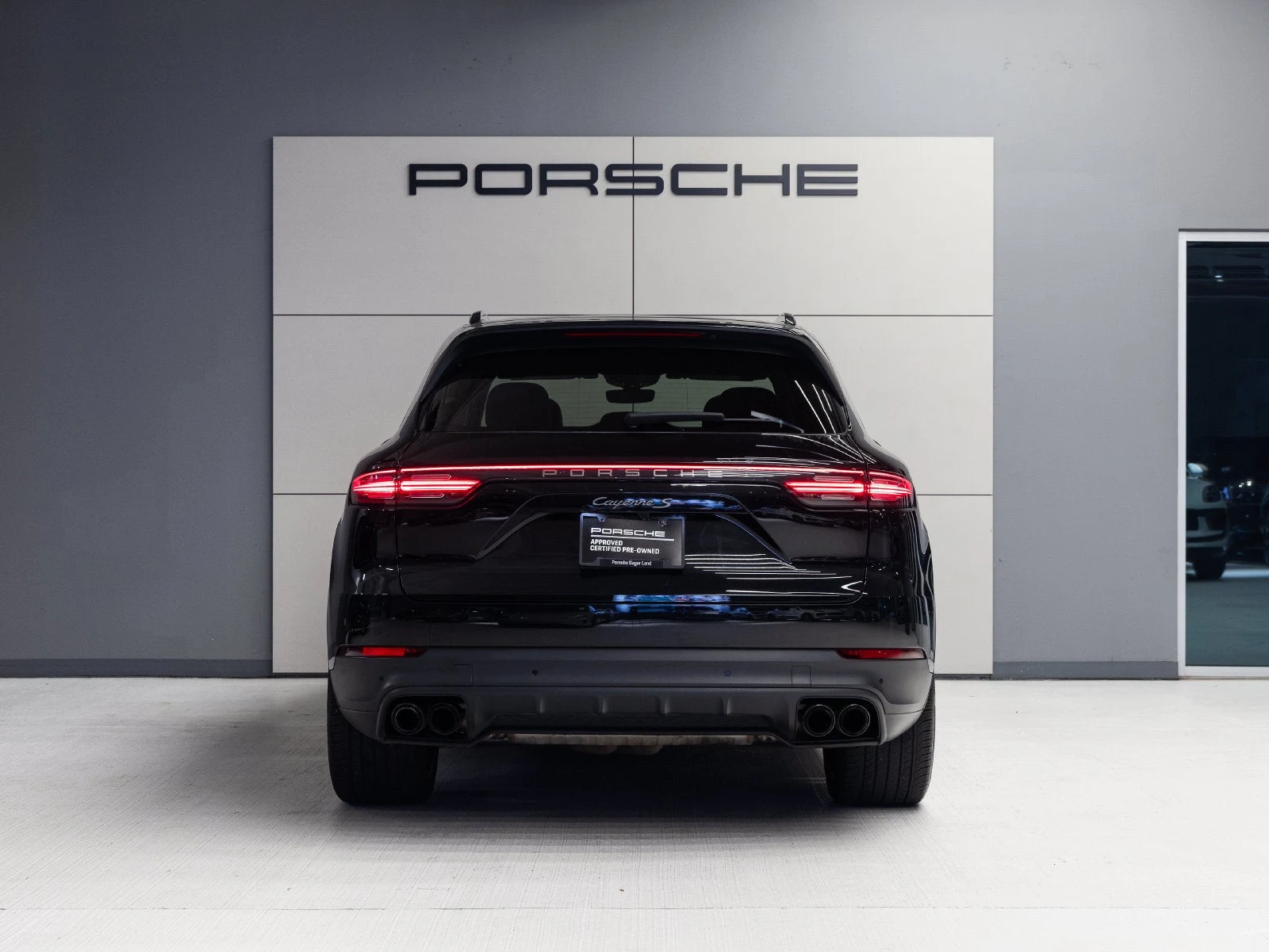 2023 Porsche Cayenne S Platinum Edition, rear three-quarter view, Black