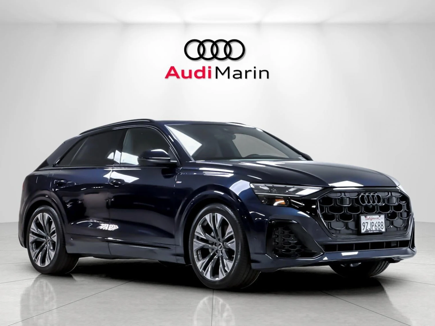 2026 Audi Q8 55 TFSI Premium Plus quattro for sale, front three-quarter view, Waitomo Blue Metallic
