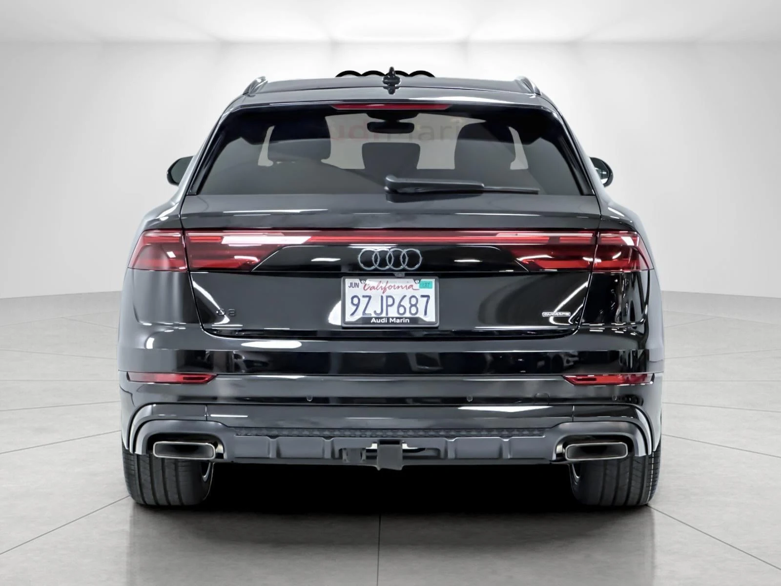 2026 Audi Q8 55 TFSI Premium Plus quattro, rear three-quarter view, Mythos Black Metallic