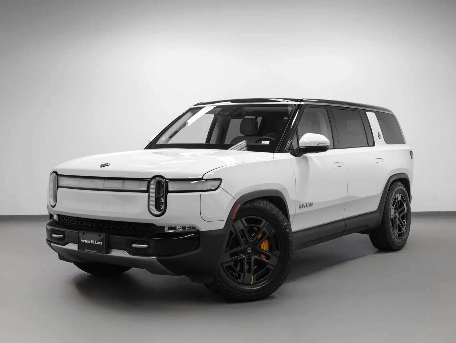 2023 Rivian R1S Adventure Quad-Motor Large Pack for sale, front three-quarter view, Glacier White