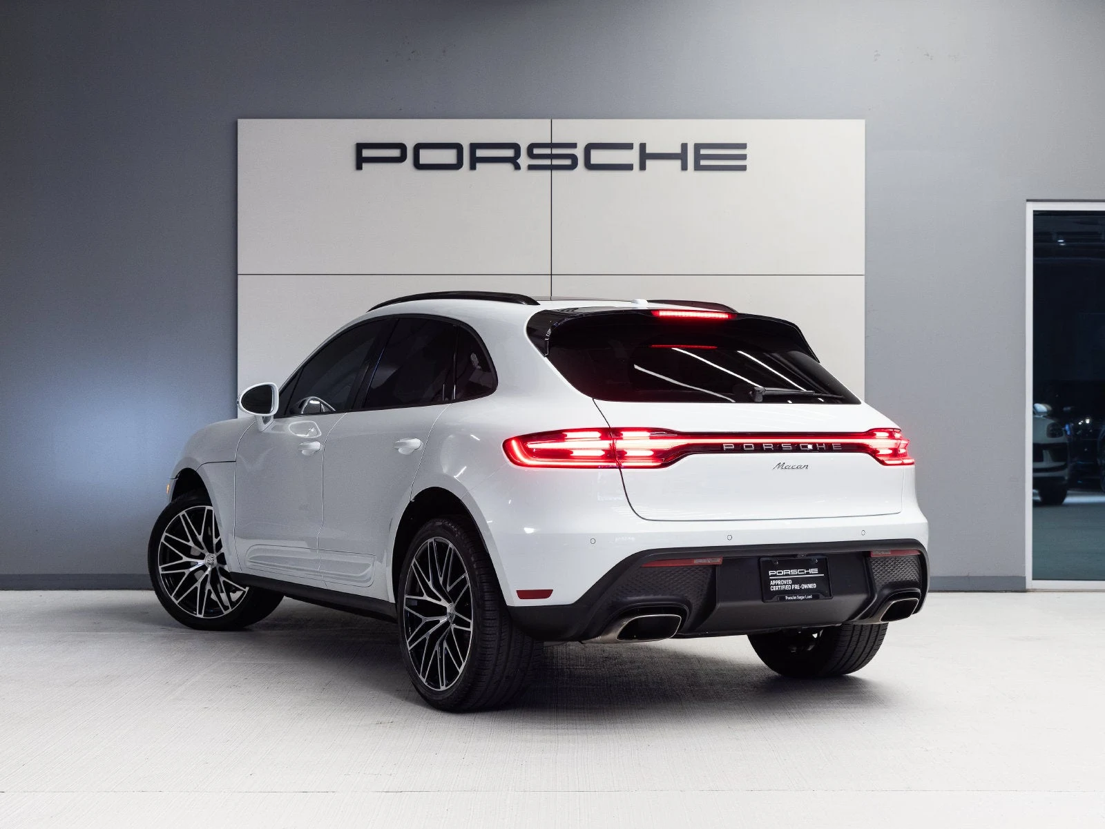 2024 Porsche Macan, rear three-quarter view, White
