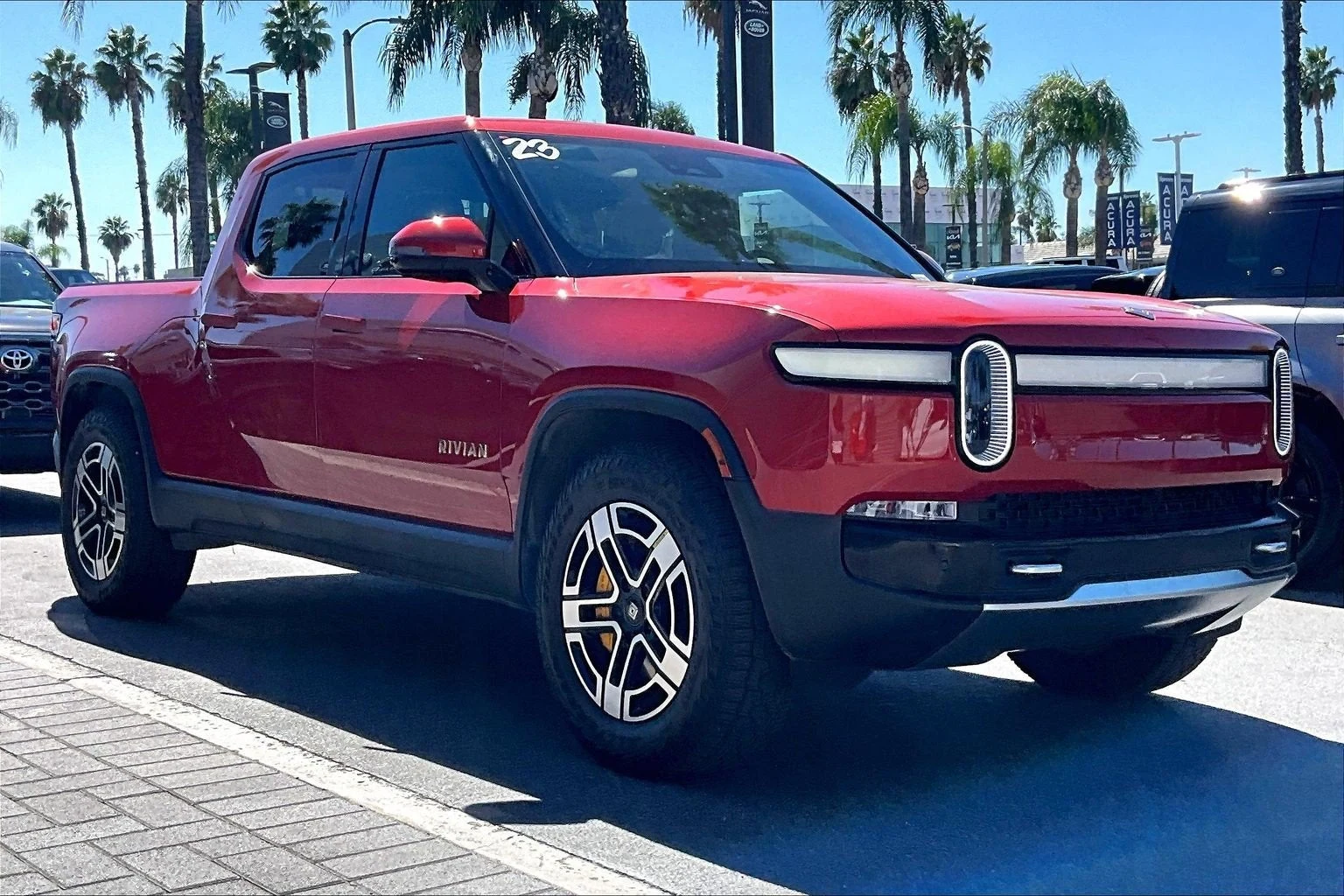 2023 Rivian R1T Adventure Quad-Motor Large Pack for sale, exterior, Red Canyon