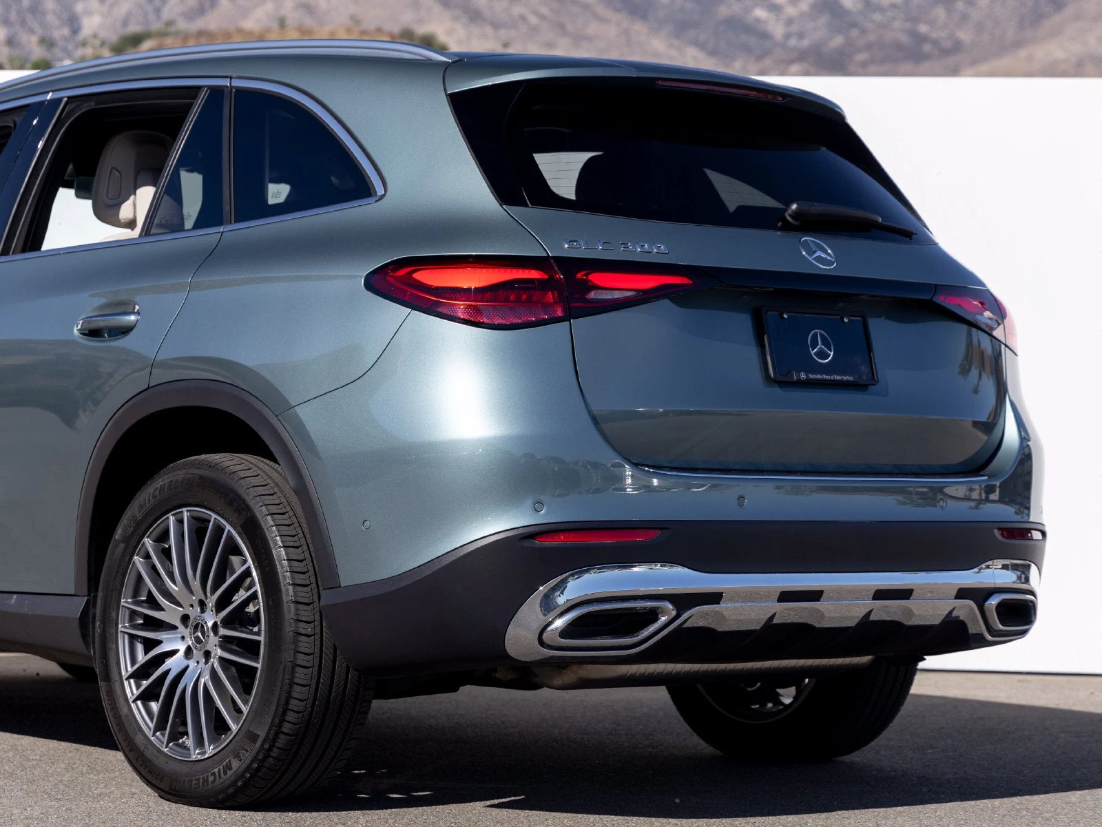 2026 Mercedes-Benz GLC 300 SUV, rear three-quarter view, Verde Silver Metallic