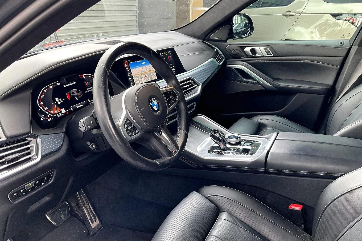 2021 BMW X6 M50i interior, dashboard, Black Extended Merino leather