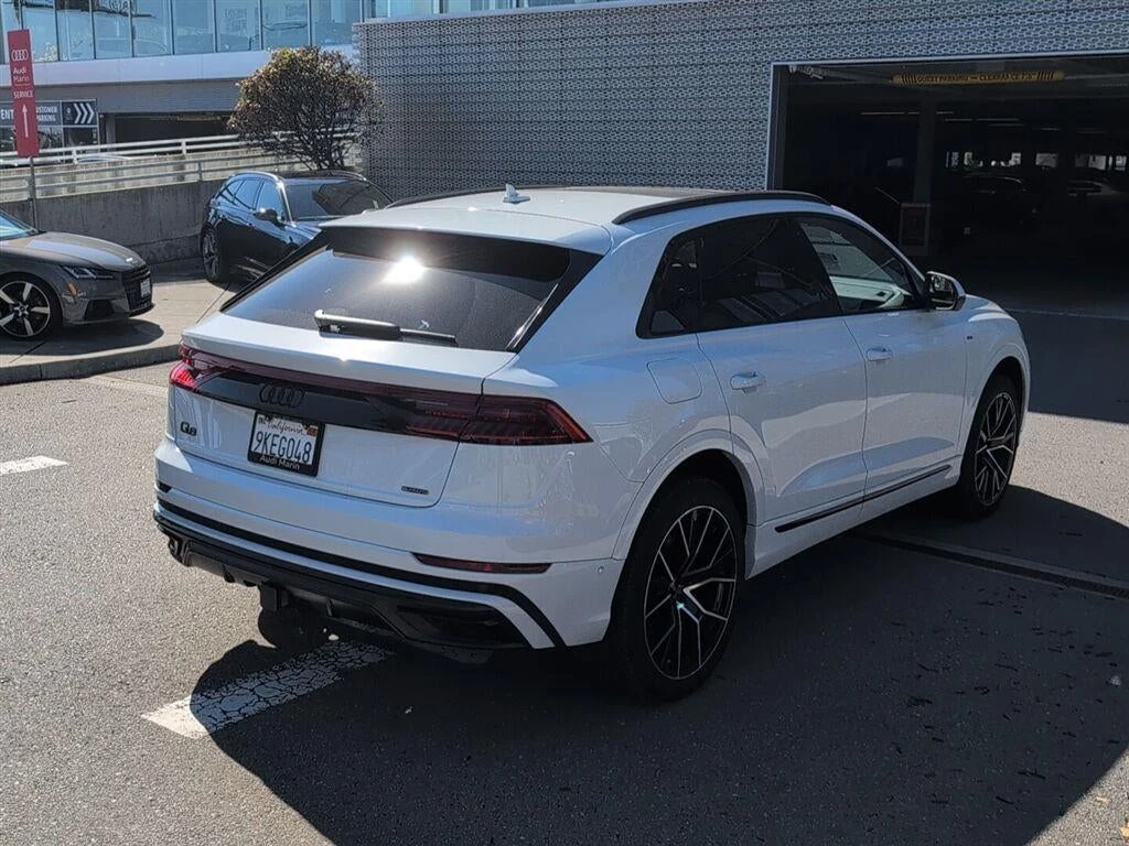 2023 Audi Q8 55 TFSI Premium Plus quattro, rear three-quarter view, Glacier White Metallic