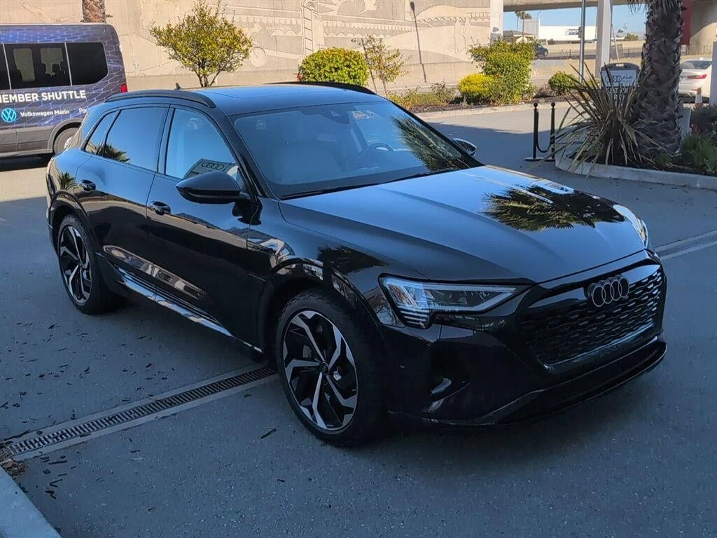 2024 Audi Q8 e-tron Prestige quattro for sale, front three-quarter view, Madeira Brown Metallic
