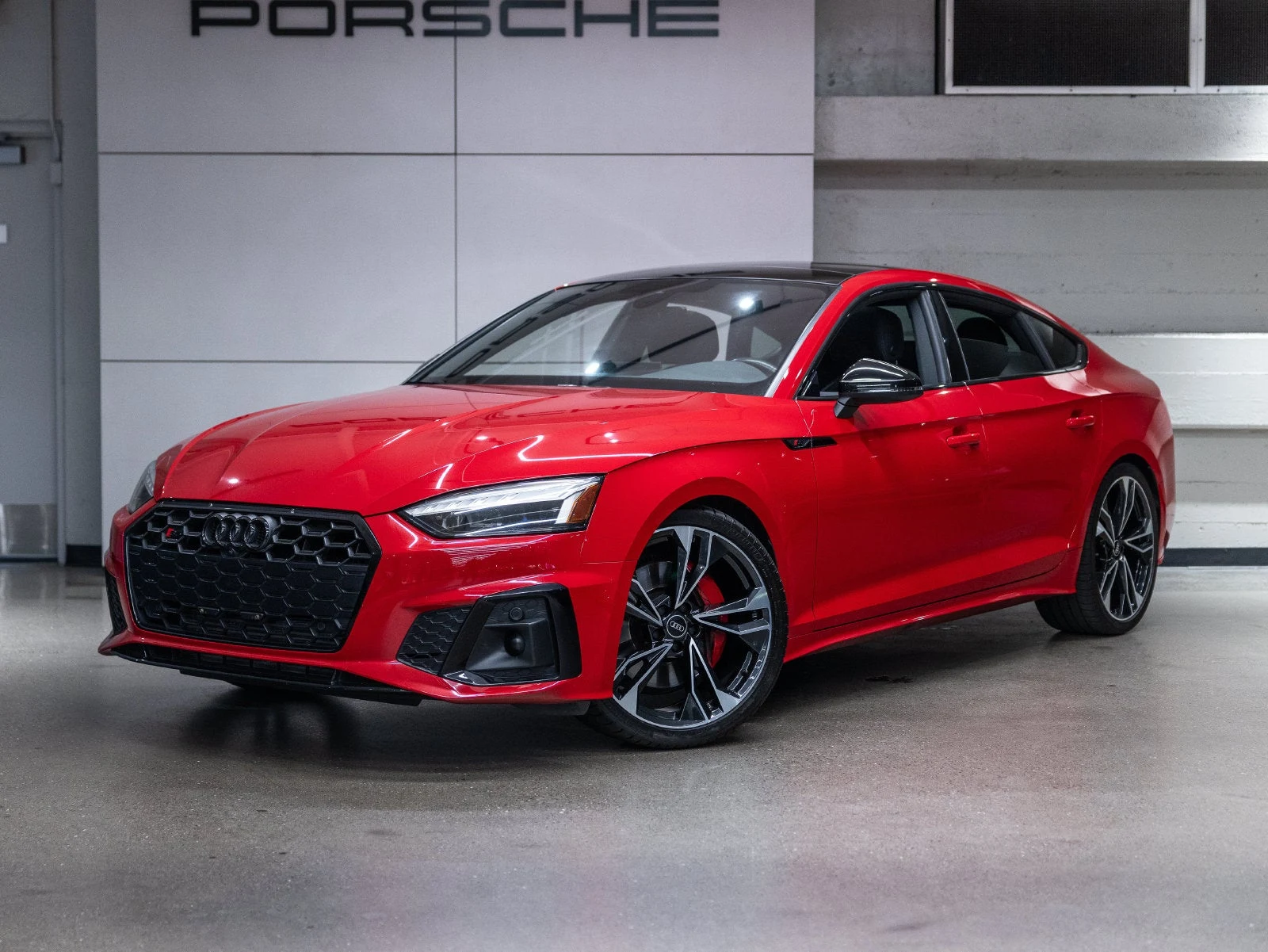 2022 Audi S5 Sportback 3.0T Premium Plus quattro for sale, front three-quarter view, Tango Red Metallic
