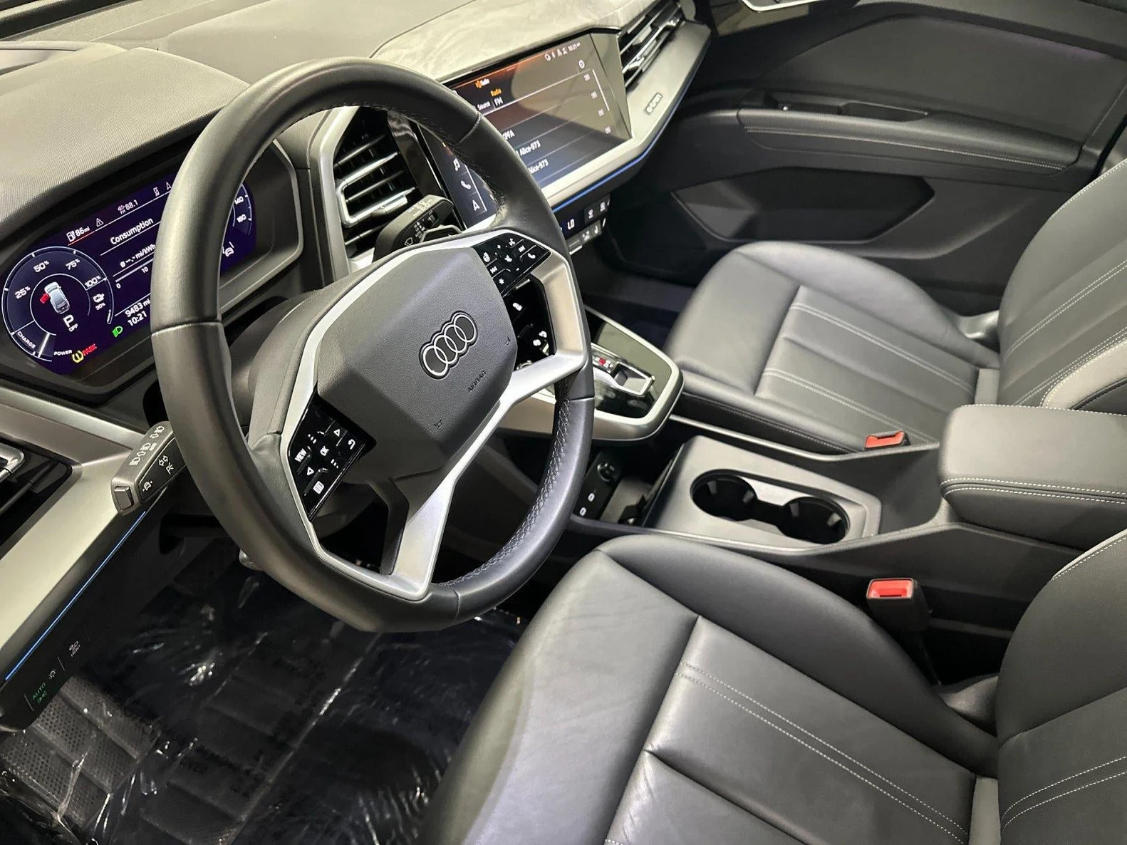 2024 Audi Q4 55 e-tron Prestige quattro interior, Black leather with Rock Gray stitching