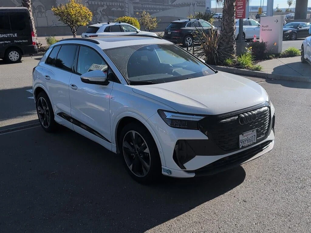 2024 Audi Q4 55 e-tron Premium Plus quattro for sale, front three-quarter view, Glacier White Metallic