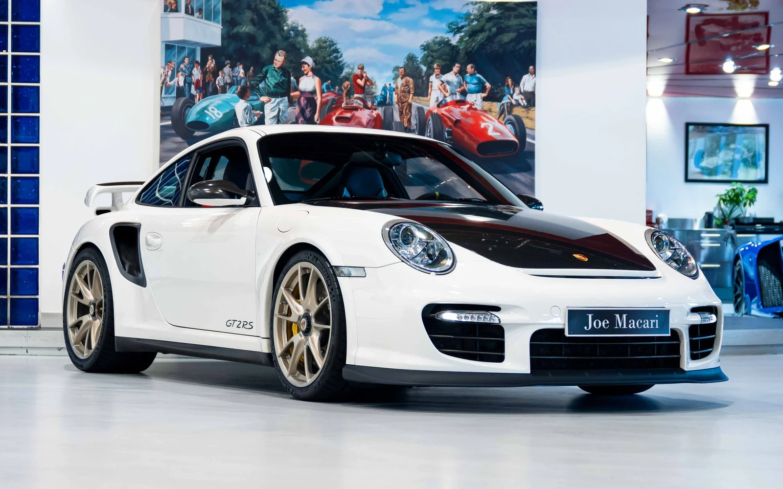 White Porsche 911 GT2 RS, full front three-quarter view