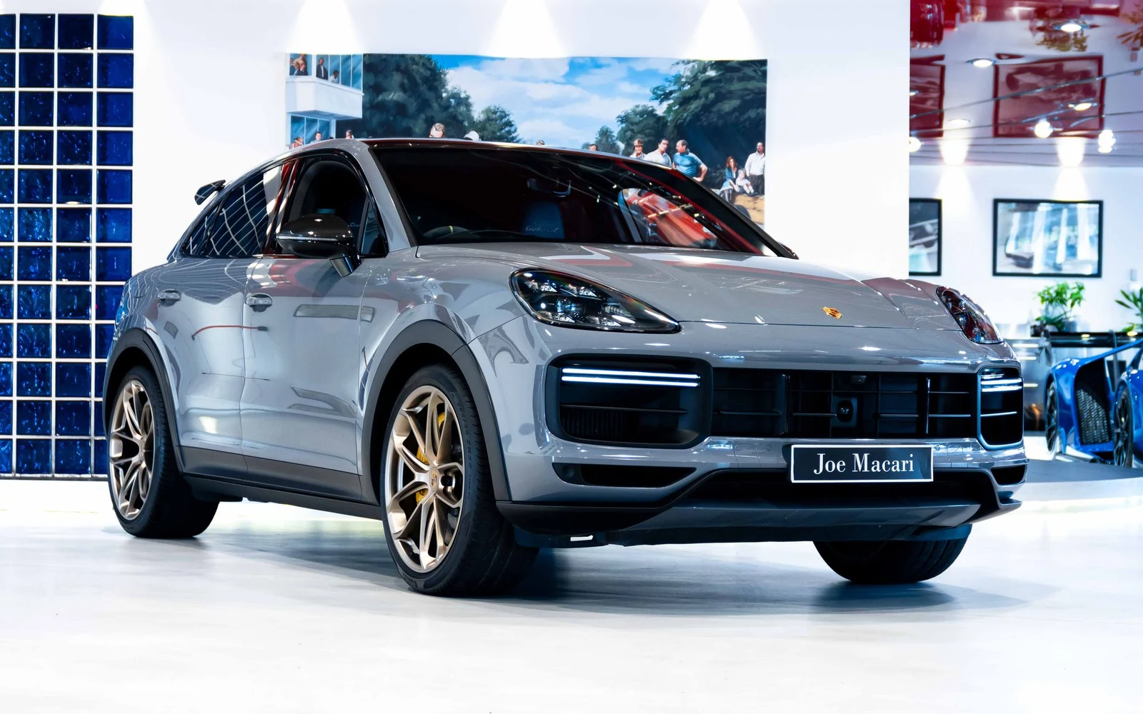 Gray Porsche Cayenne Turbo GT, full front three-quarter view